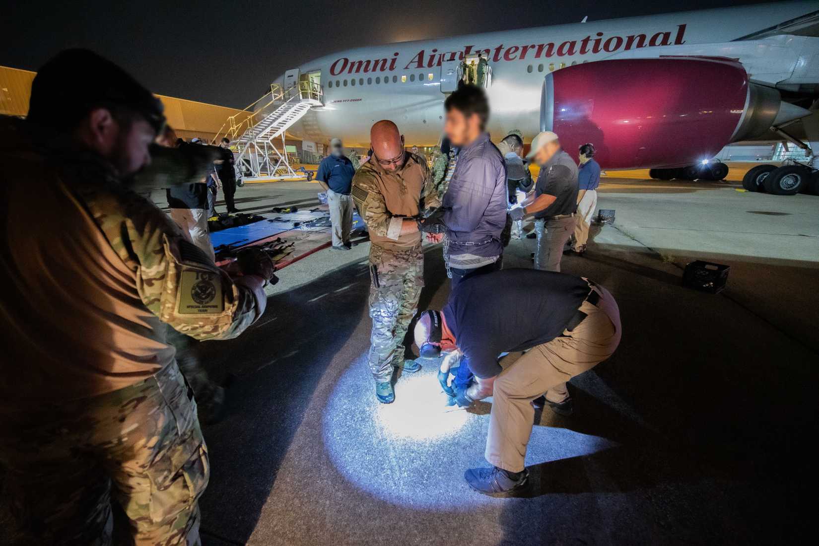 A deportation flight to Cambodia baords under a ICE Enforcement and Removal Operations ICE Air Operations flight from Dallas, Texas.