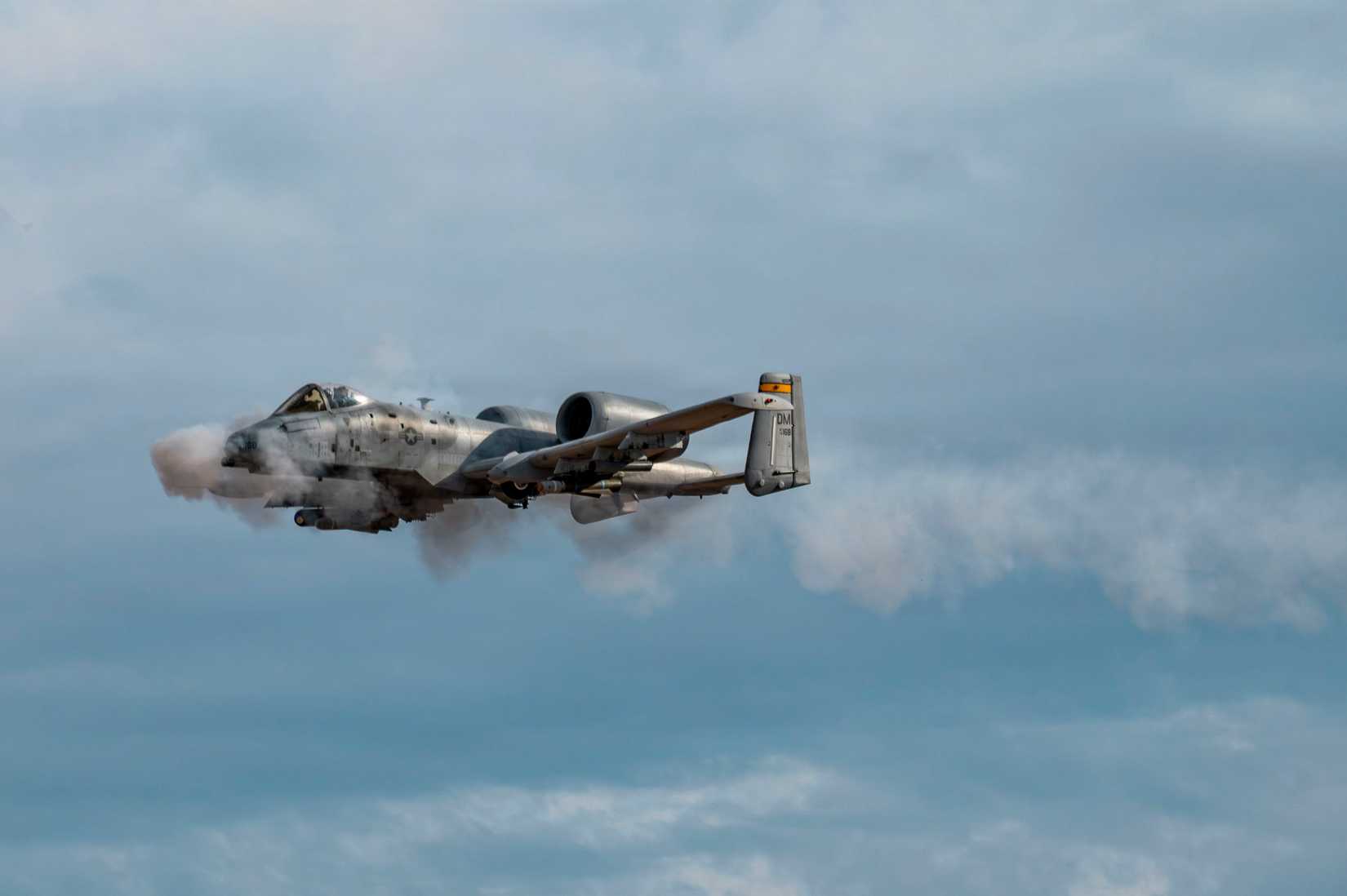A U.S. Air Force A-10C Thunderbolt II aircraft assigned to the 357th Fighter Generation Squadron fires its GAU-8 30 mm Gatling gun.
