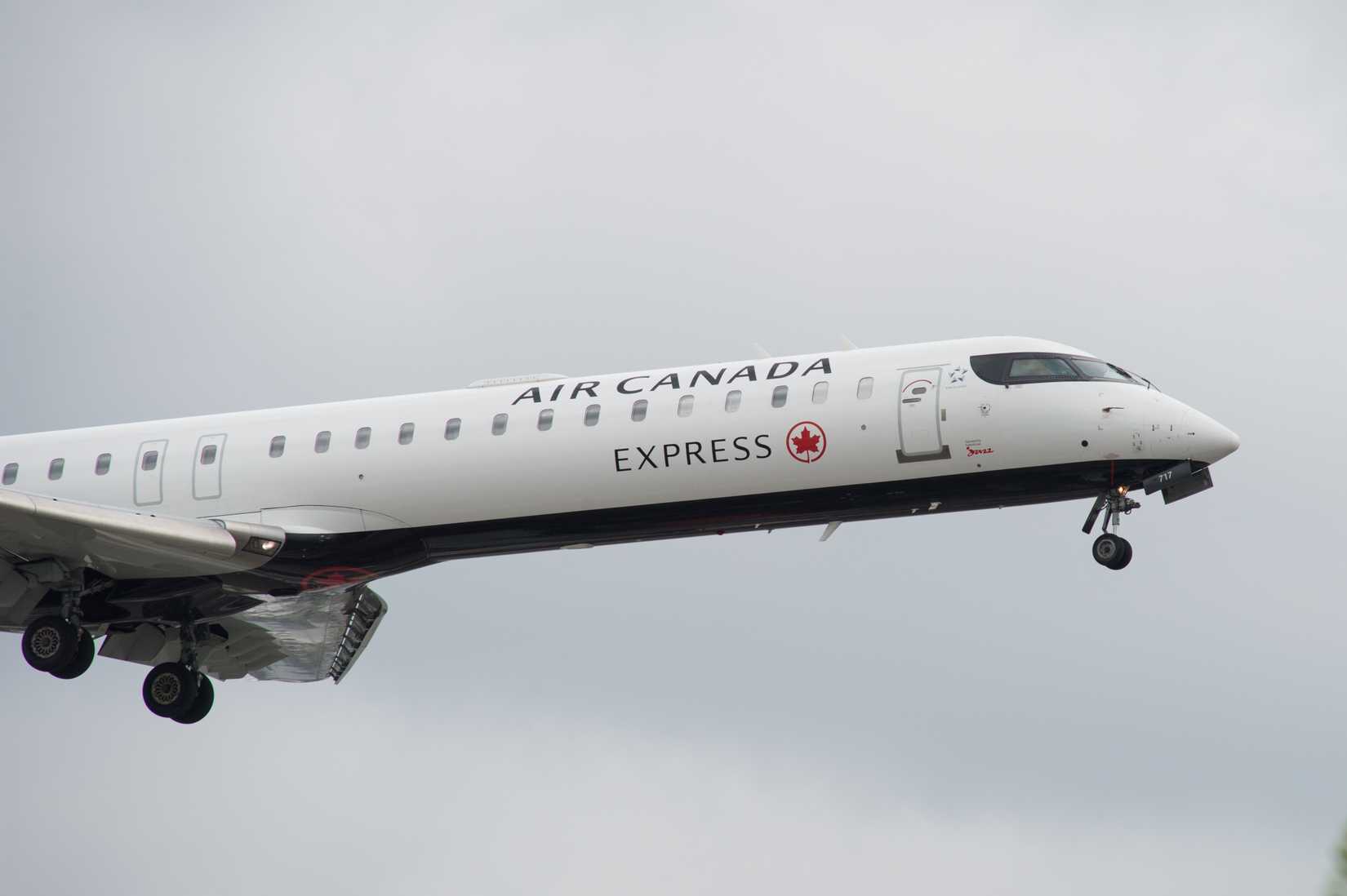 Air Canada CRJ900 lands at Toronto Pearson International Airport.