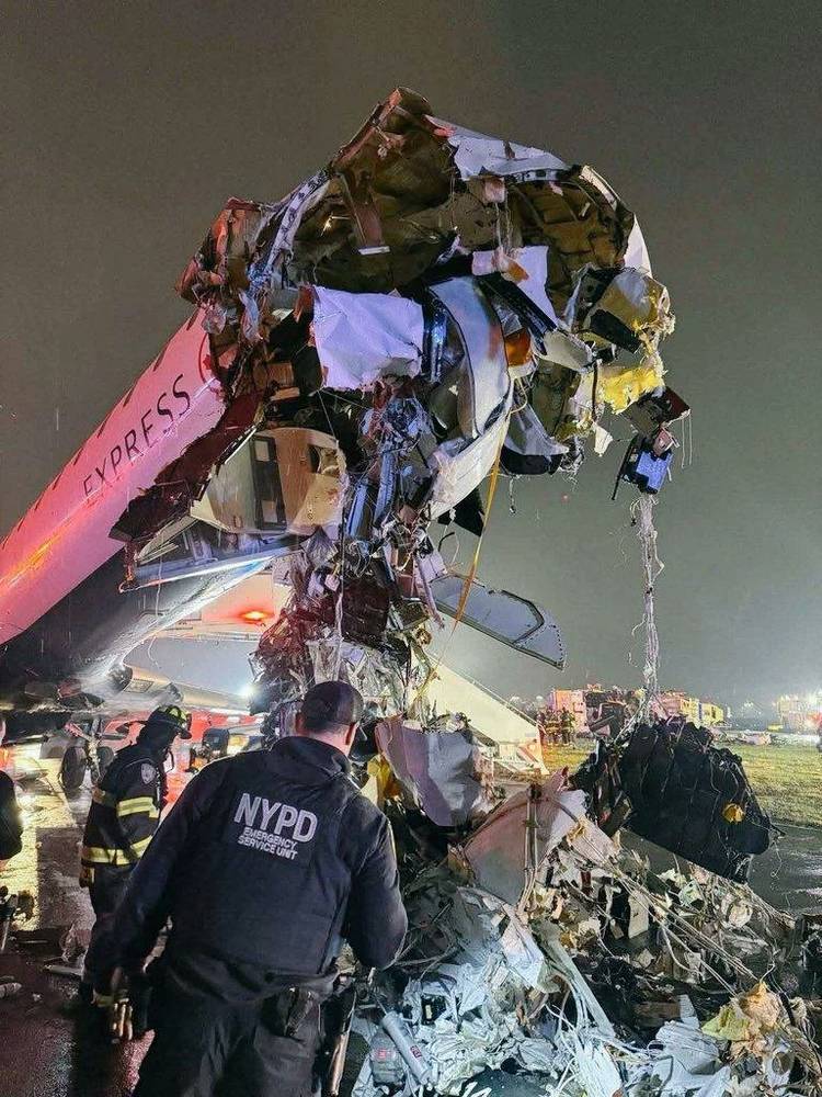 Air Canada Express Flight 8646 wreckage LGA from ground