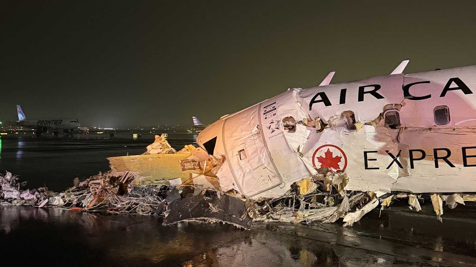 Air Canada Express Flight 8646 wreckage LGA