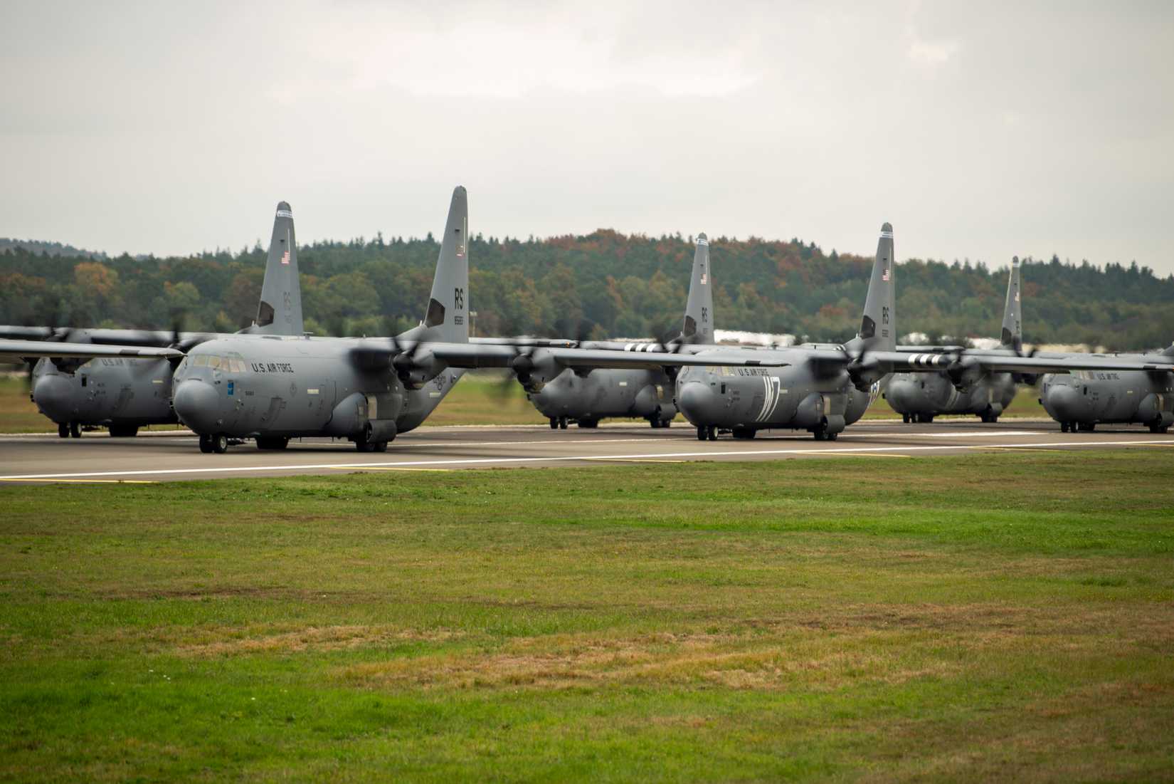 Air Force C-130J Super Hercules aircraft line up in formation for maximum generation at Ramstein Air Base, Germany, Oct. 15, 2025.