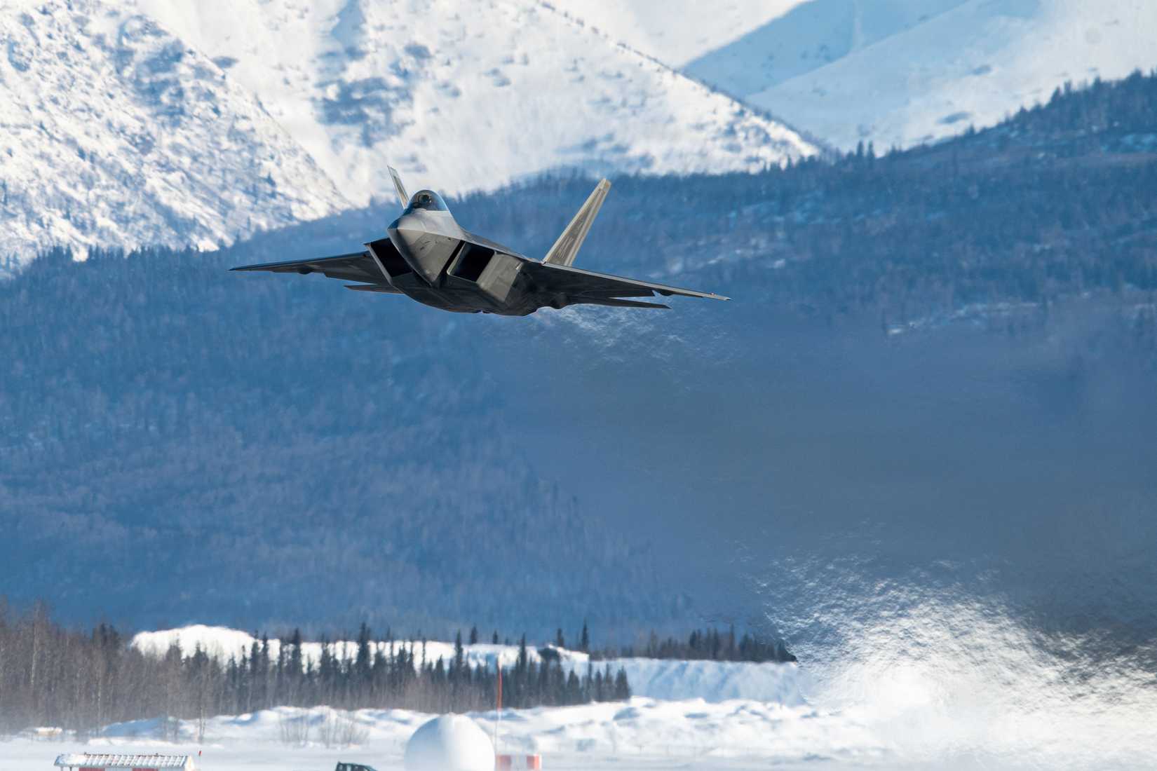 Air Force F-22 Raptor aircraft assigned to the 3rd Wing takes off during a routine training sortie at Joint Base Elmendorf-Richardson, Alaska, Feb. 20, 2026.