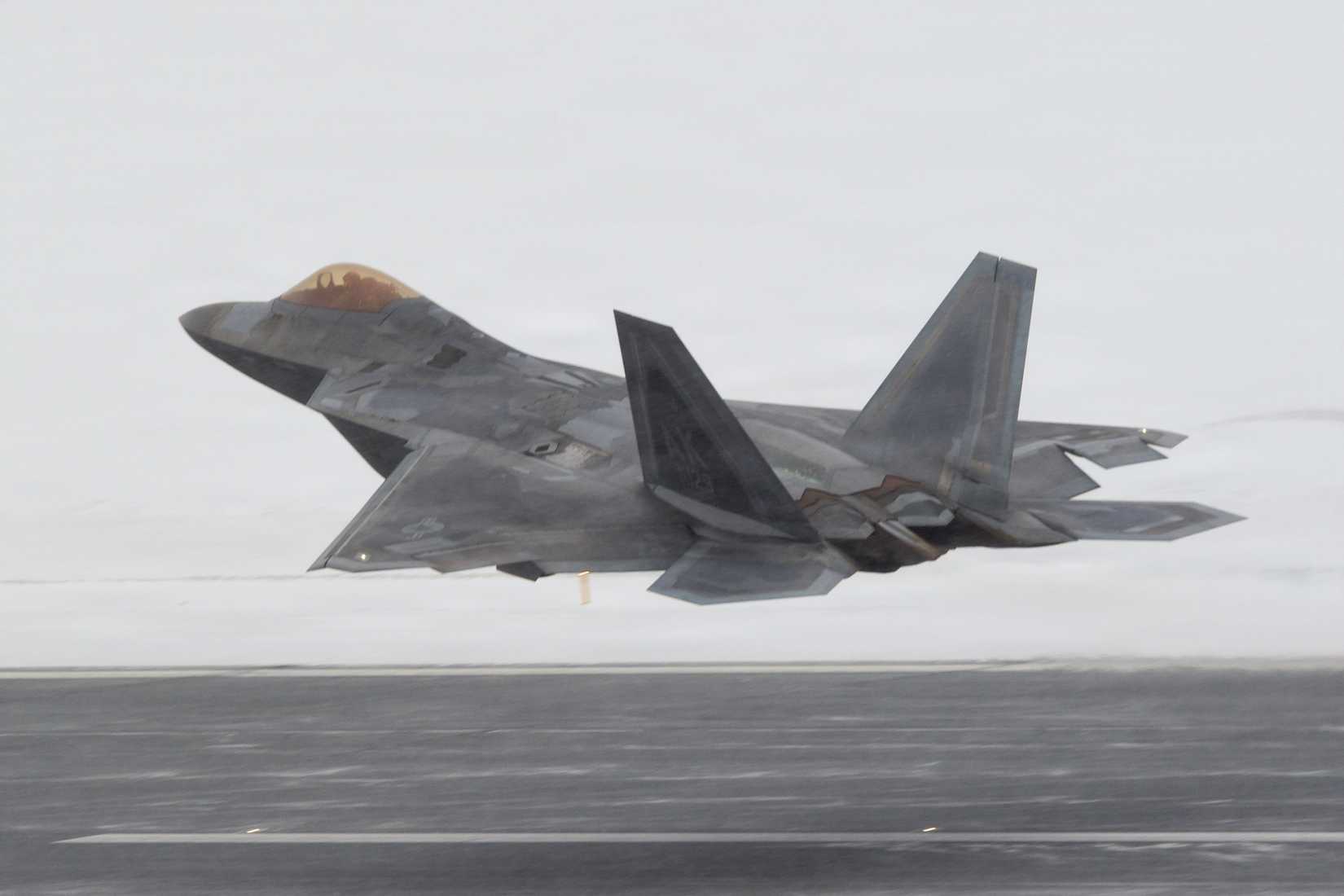 Air Force F-22 Raptor assigned to 3rd Wing takes off during snowfall at Joint Base Elmendorf-Richardson, Alaska, Feb. 10, 2026.