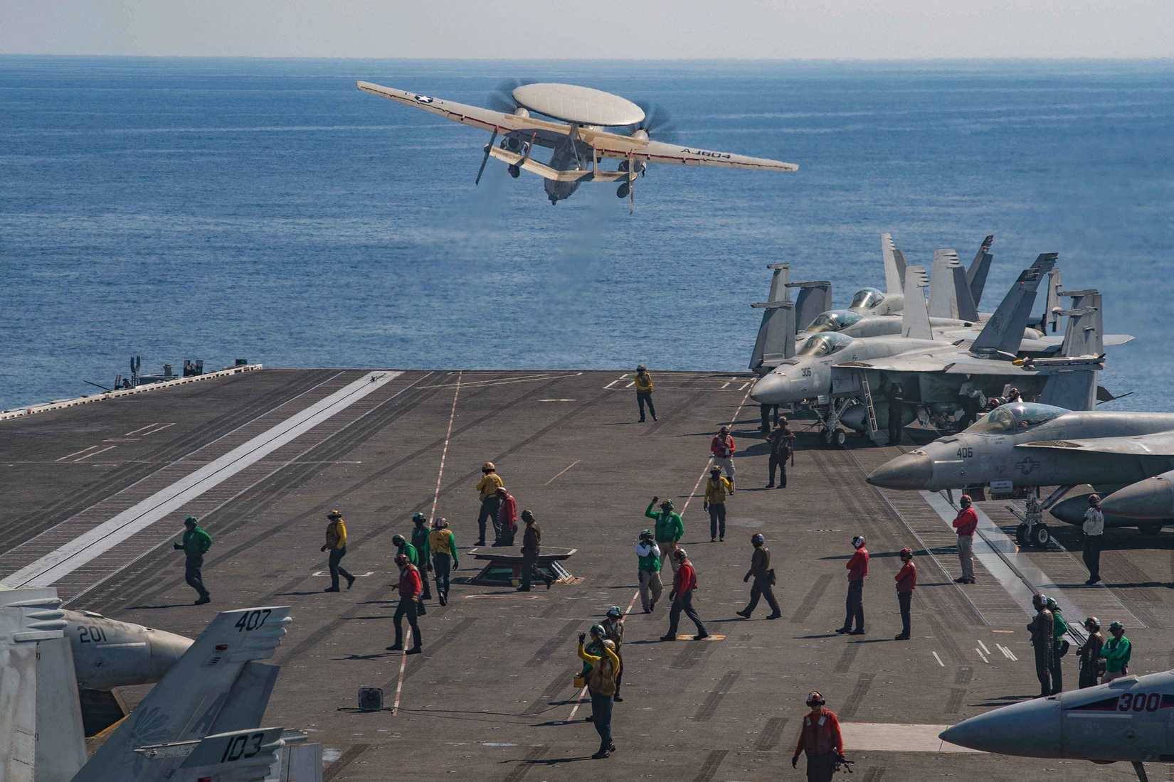 An E-2D Hawkeye attached to the “Bear Aces” of Airborne Command and Control Squadron (VAW) 124 launches.