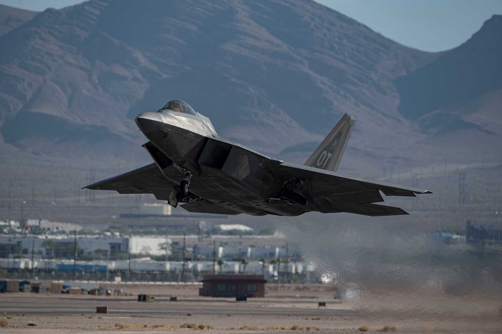 An F-22 Raptor assigned to the 433rd Weapons Squadron takes off from Nellis Air Force Base.