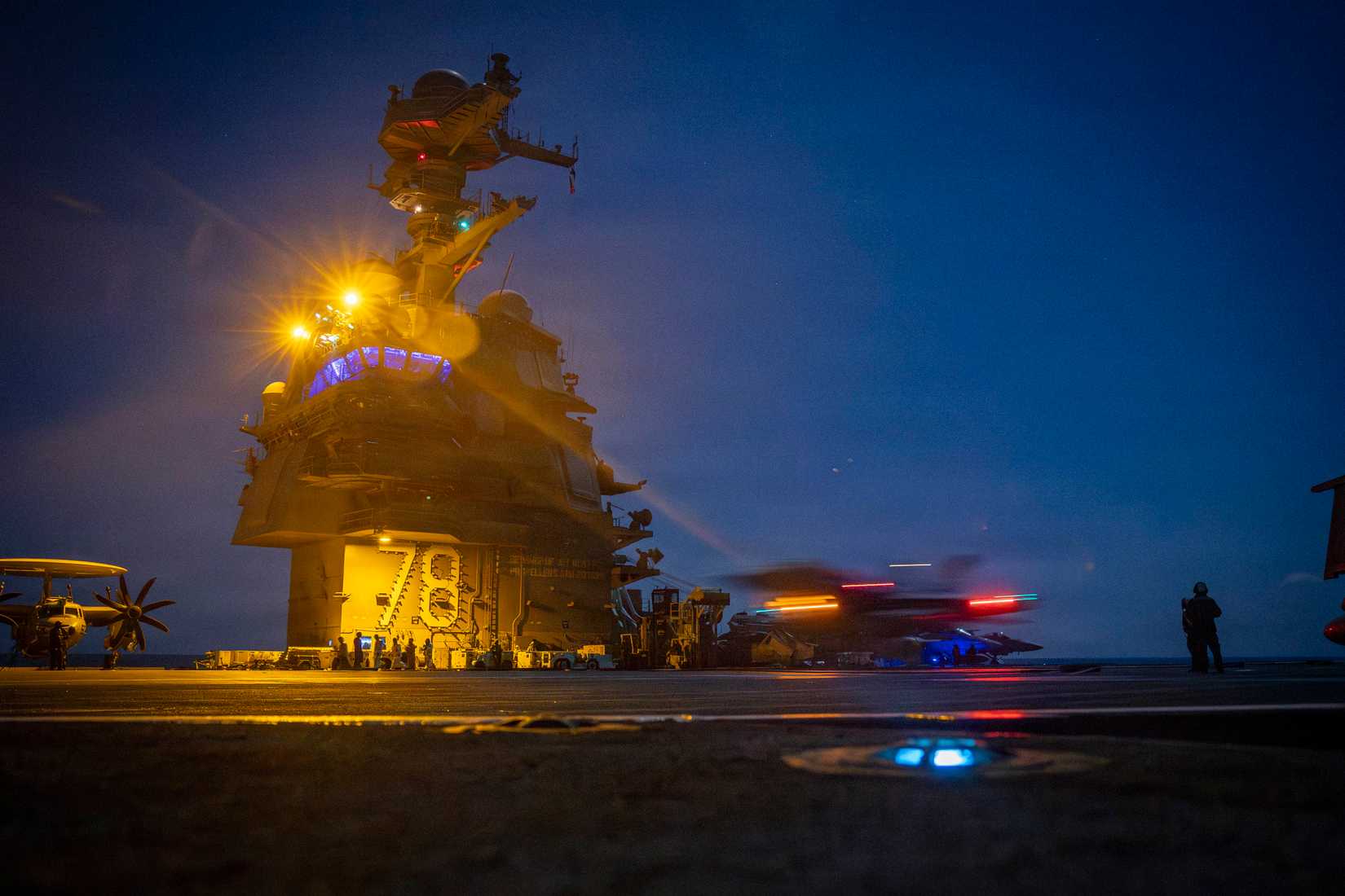 An FA- 18E Super Hornet aircraft, attached to Strike Fighter Squadron 37, lands on the flight deck of the world’s largest aircraft carrier, USS Gerald R. Ford (CVN 78).