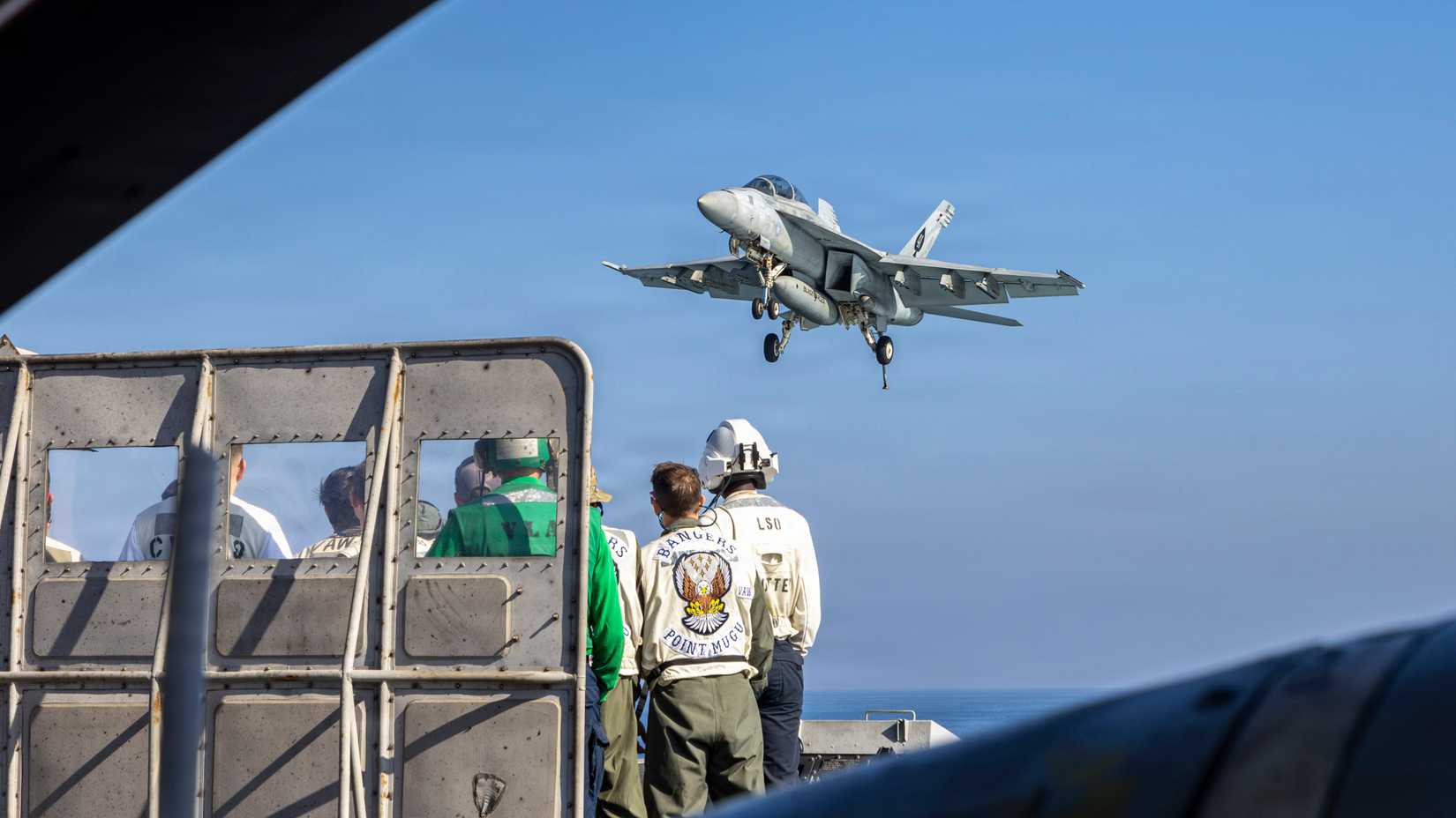 An FA-18F Super Hornet, attached to Strike Fighter Squadron (VFA) 41, prepares to make an arrested landing on the flight deck of USS Abraham Lincoln (CVN 72).