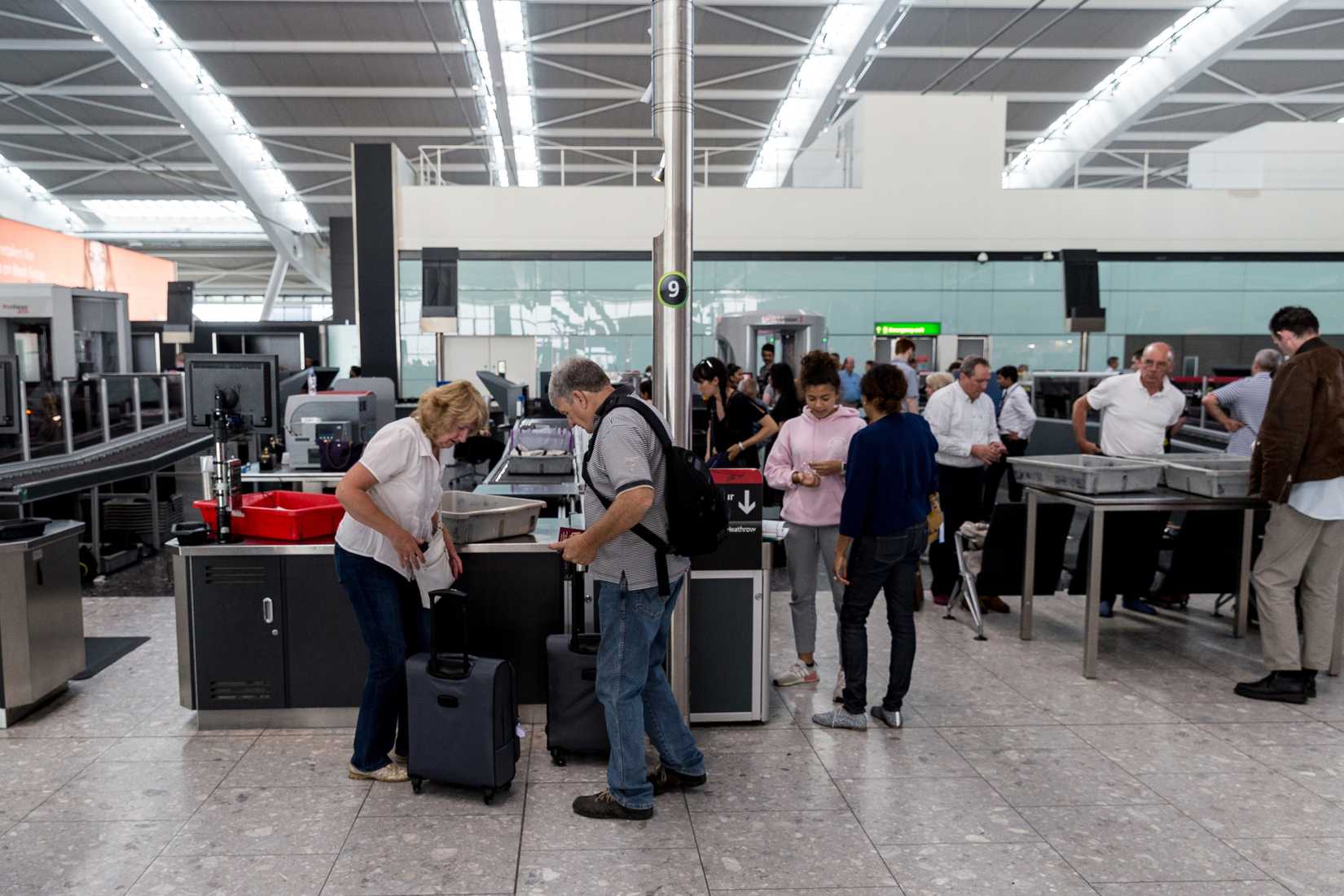 Passengers in line at an airport security check