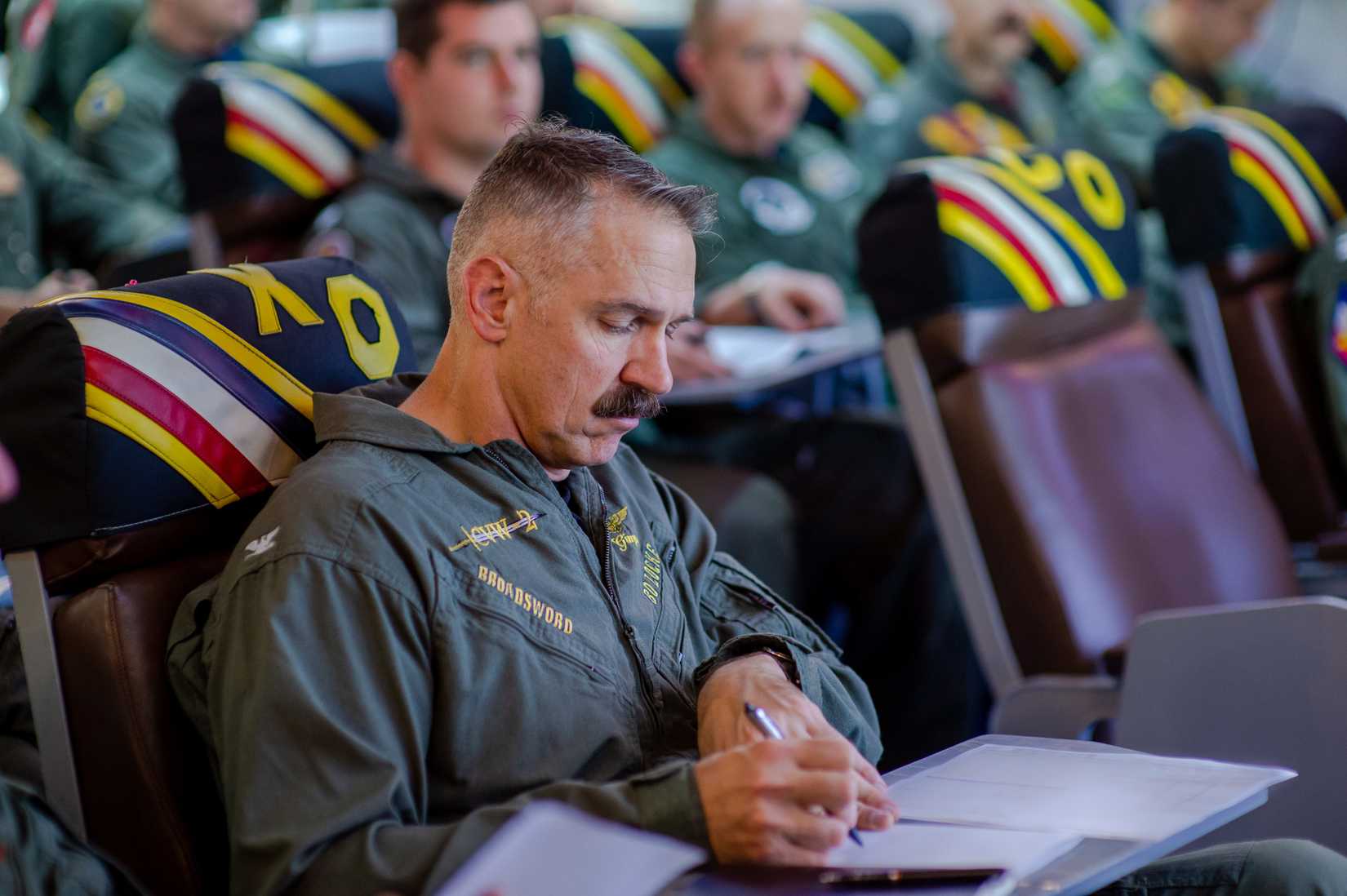 Captain Locke, commander Carrier Air Wing 2, in Ready Room Five aboard USS Carl Vinson Oct. 22, 2021.