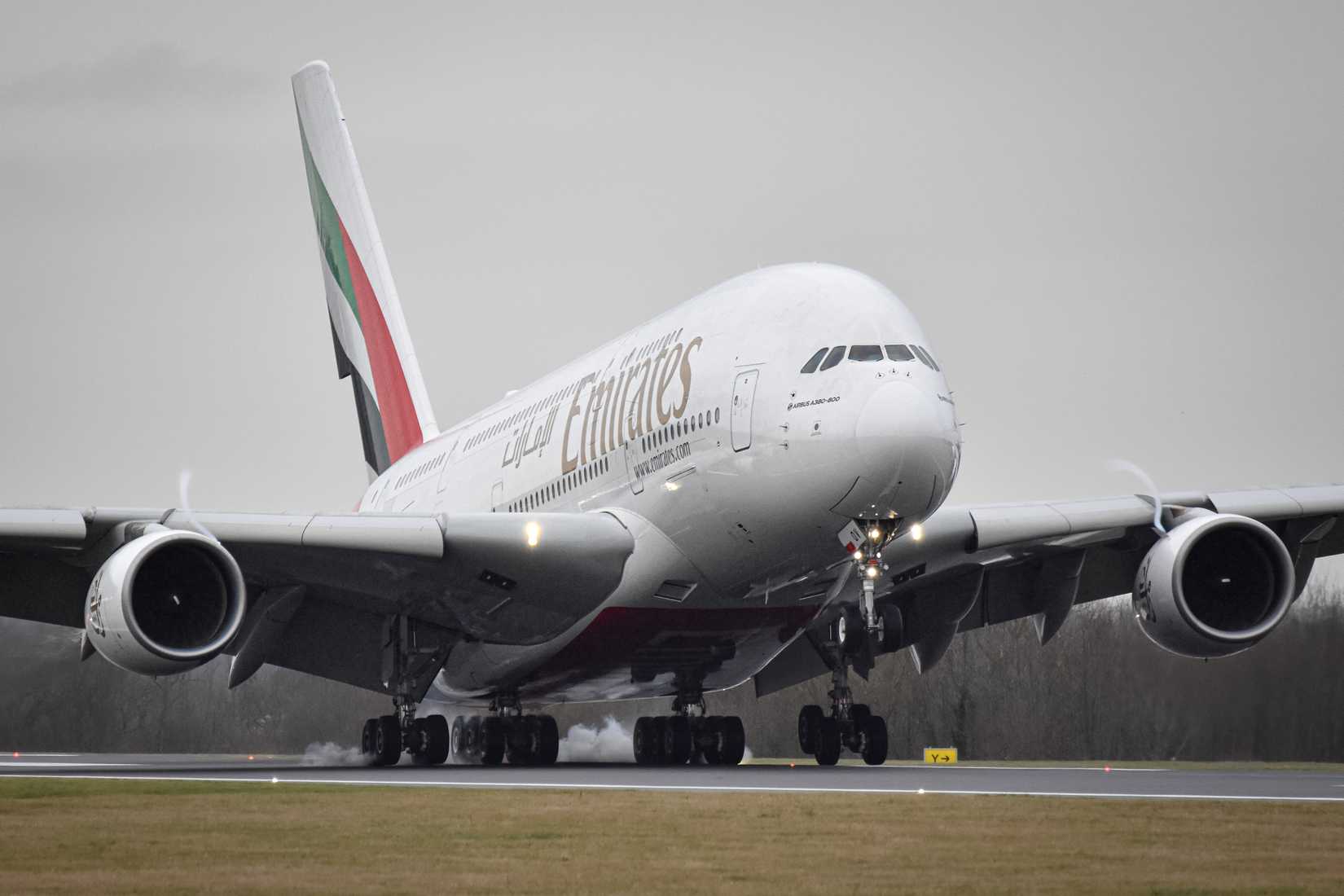 Emirates Airbus A380 A6-EOV arriving at Manchester Airport.