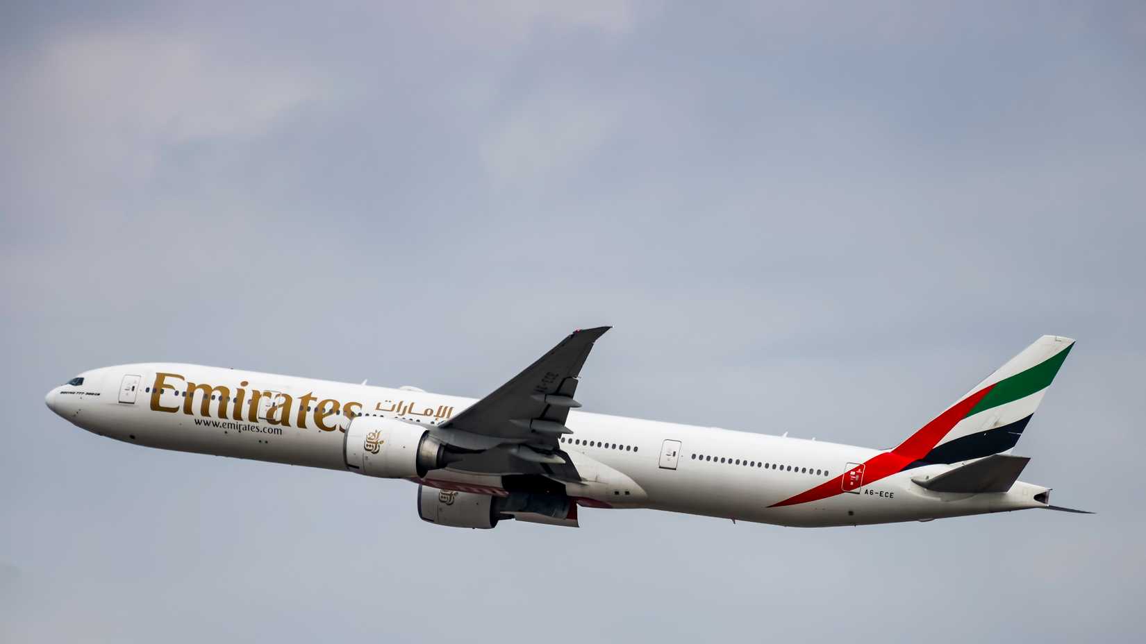 Emirates Boeing 777-300ER taking off from Terminal 1, Changi Airport.