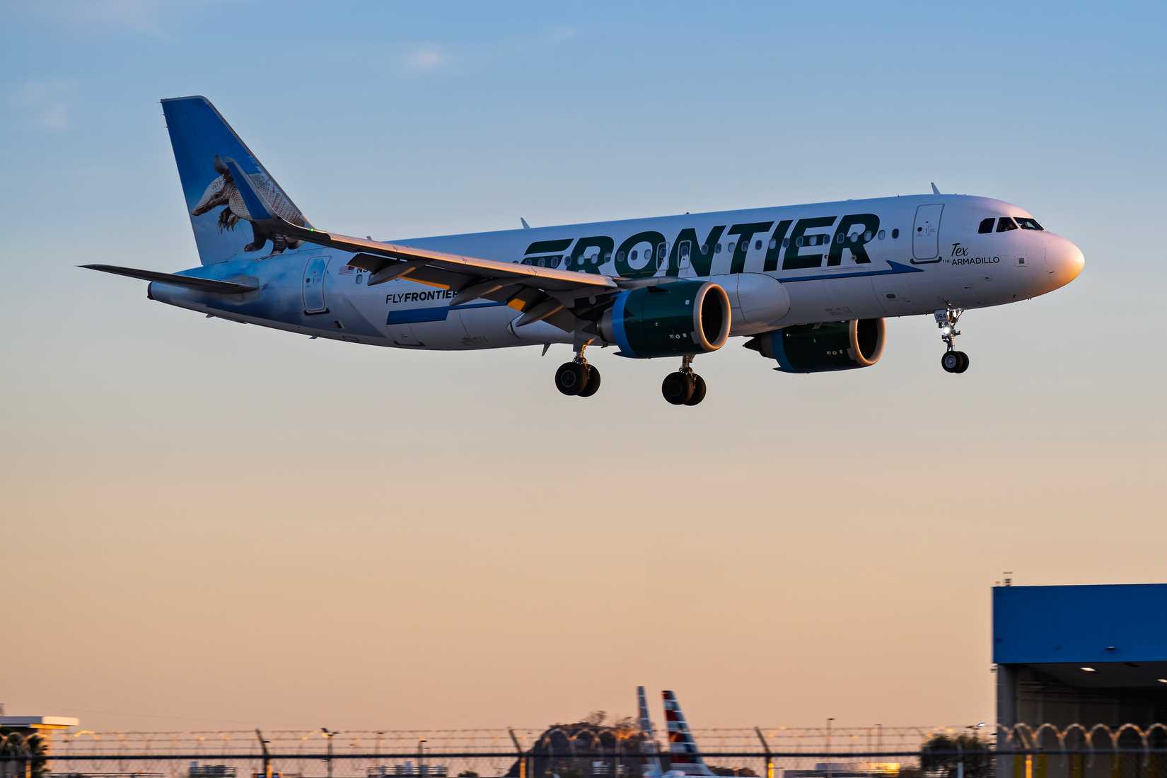 Frontier Airlines Airbus A320Neo N364FR Sunset arrival at Phoenix Sky Harbor Intl. Airport.