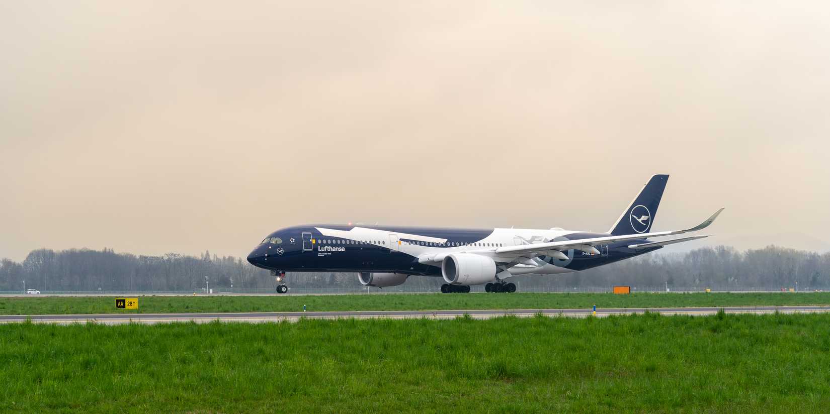 Lufthansa Airbus A350-900 (D-AIXL) 100th Anniversary Livery takes-off at BGY Milano Bergamo international airport.