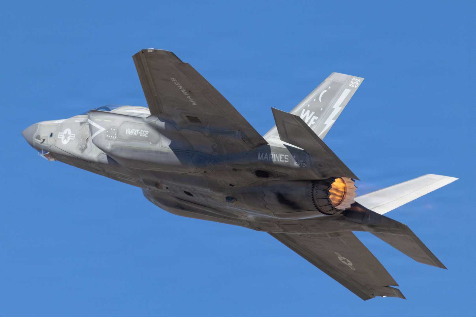 Marine Corps F-35B Lightning II lights its afterburner and climbs during the Luke Days 2026 airshow.