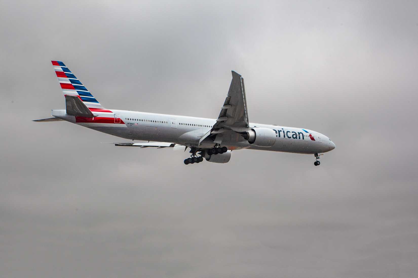 N736AT American Airlines Boeing 777-300ER landing at London Heathrow.