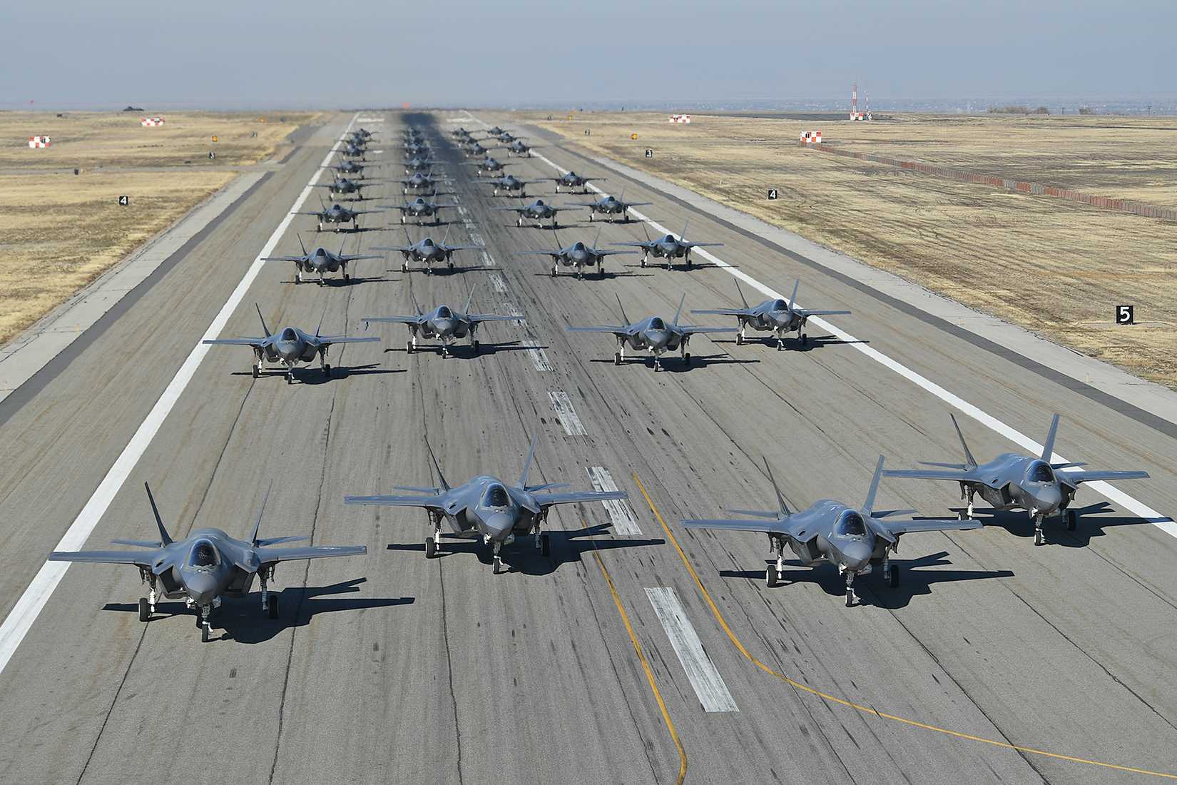 Pilots from the 388th and 419th Fighter Wings taxi F-35As on the runway in preparation for a combat power exercise at Hill Air Force Base.