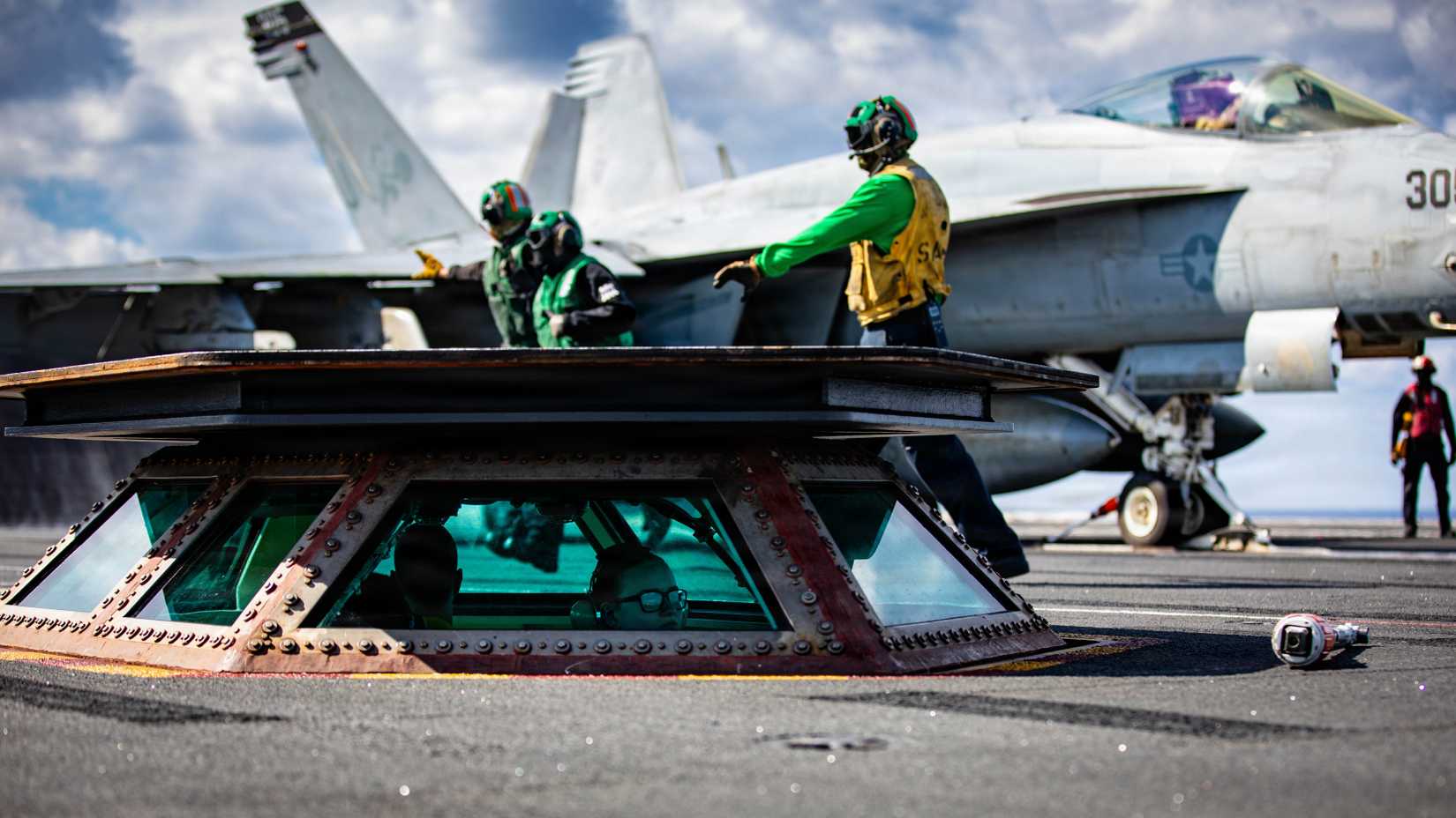 Sailors conduct flight deck operations on the flight deck of USS Gerald R. Ford (CVN 78).