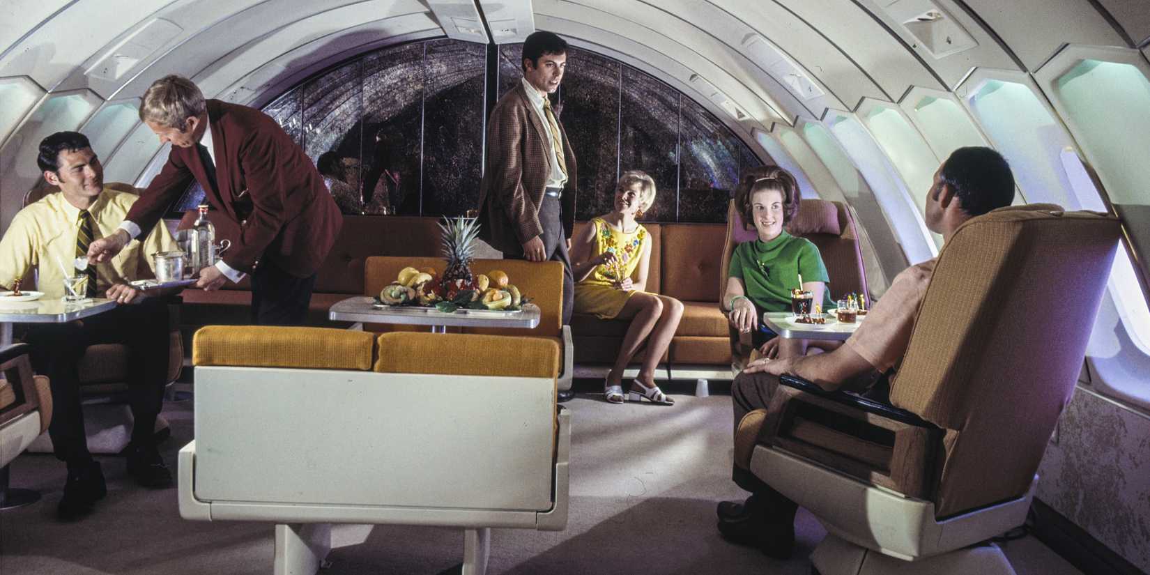 SAS Boeing 747-B Huge Viking. Interior of cabin, first class, service on board. 1970s