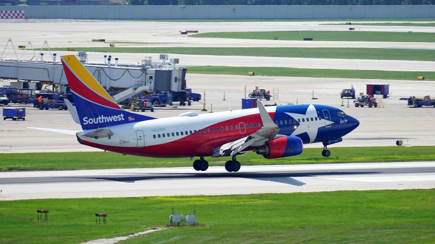 Southwest Airlines Boeing 737 with Lone Star One livery lands at Chicago Midway International Airport. 