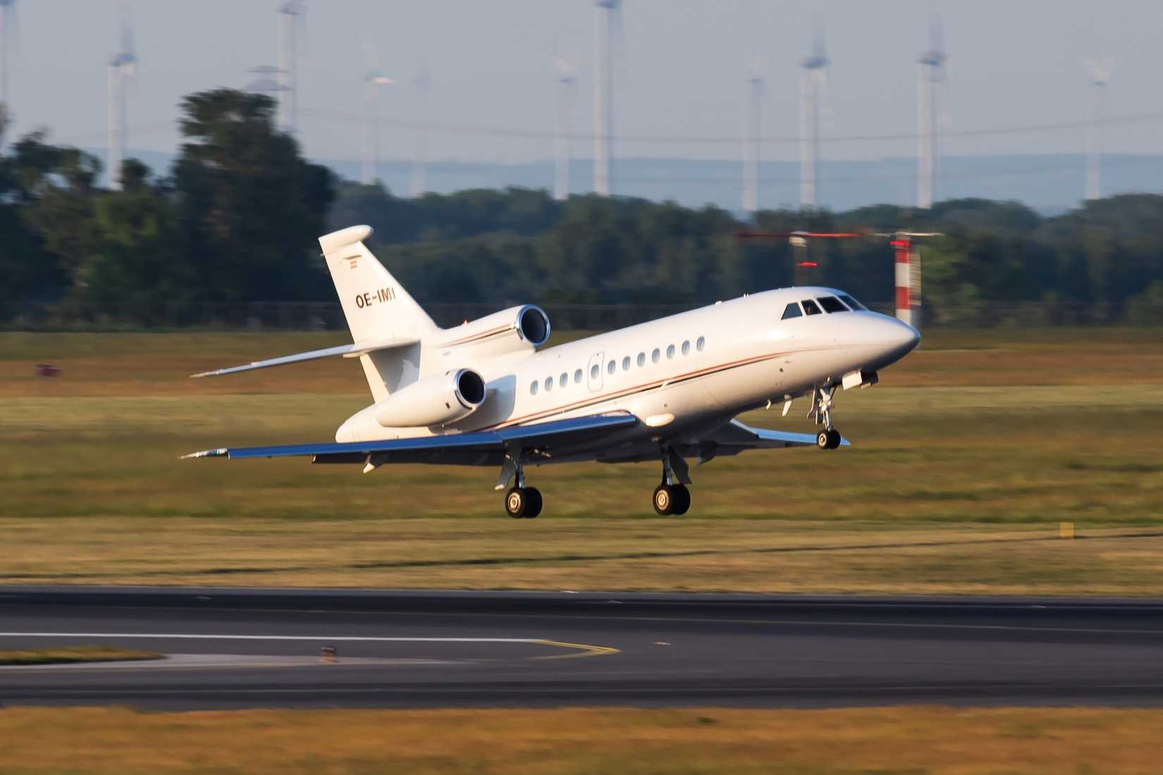 Avcon Jet Dassault Falcon 900 OE-IMI passenger plane departure and take off at Vienna Airport