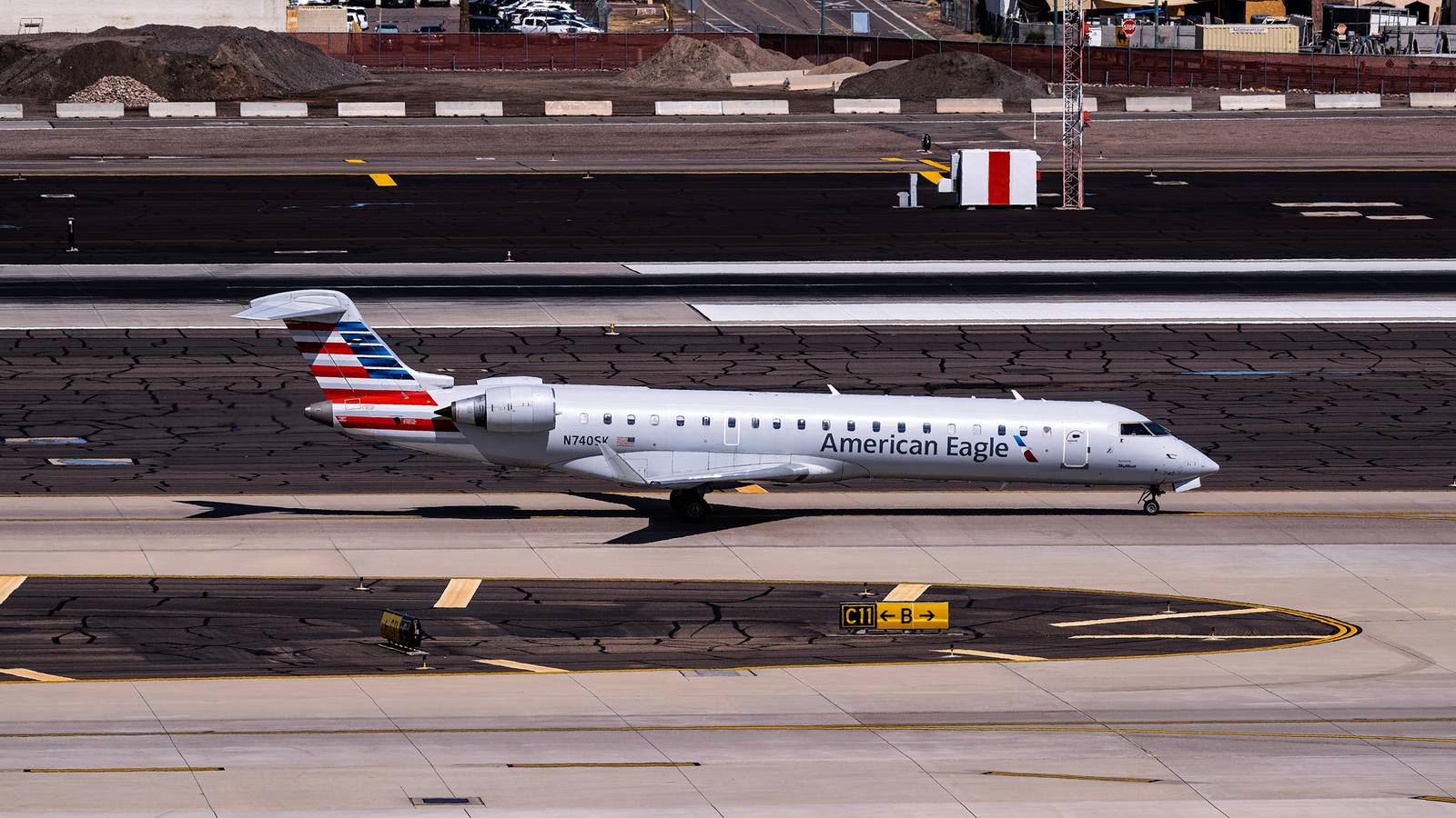 Runway Debris Punches Hole In American Eagle CRJ-700 Radome During DCA Takeoff