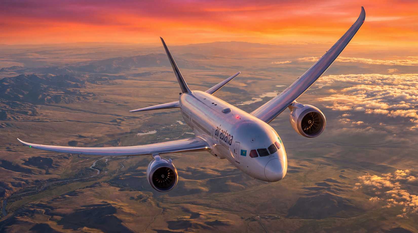 An Air Astana Boeing 787-9 Dreamliner is captured in flight, banking slightly toward the viewer. The aircraft features a white fuselage with "airastana" titles and the flag of Kazakhstan near the cockpit. The scene is set against a dramatic sunset, with the sky glowing in vibrant shades of orange and pink above a vast, mountainous landscape partially covered by a layer of white clouds.