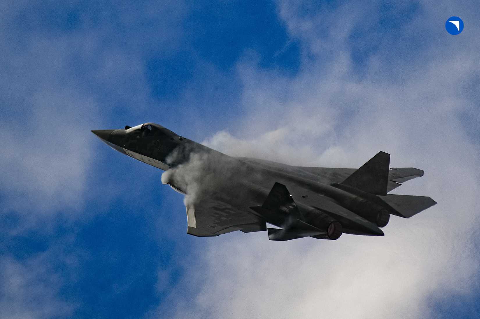 The 5th-generation Su-57E fighter aircraft in a demo flight.