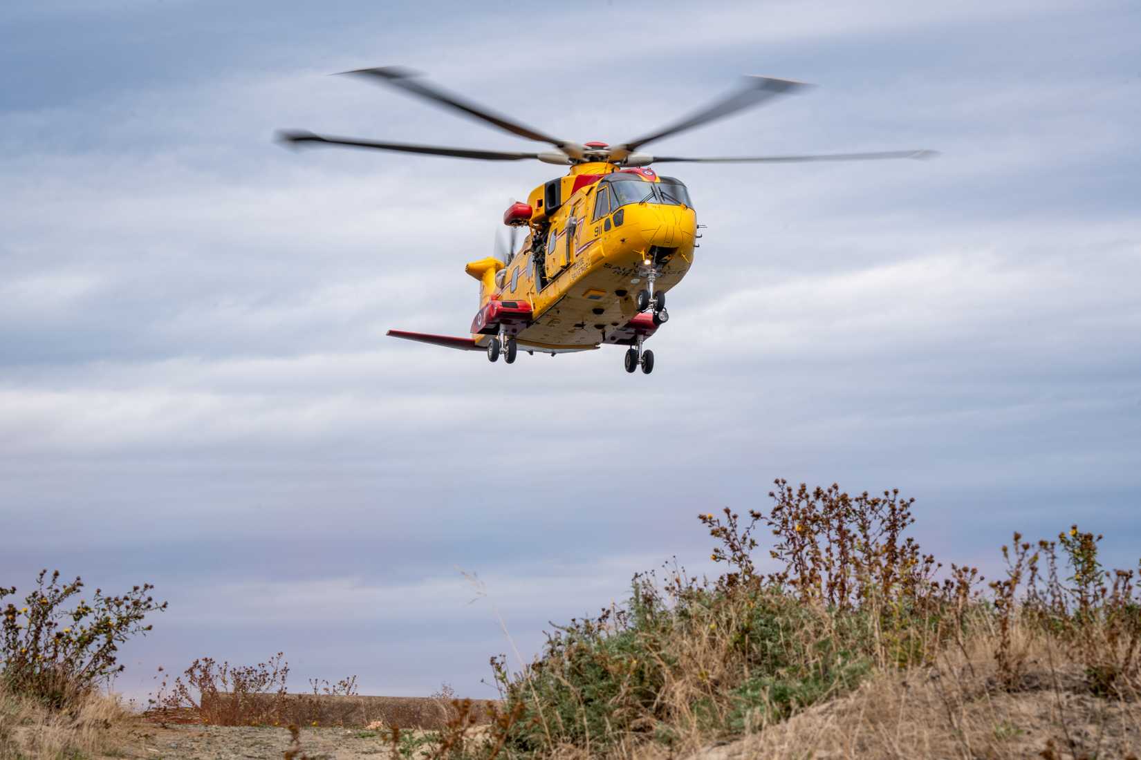The Royal Canadian Air Force CH-149 Cormorant comes in for a landing at Air Force Beach in Comox, BC, Canada.