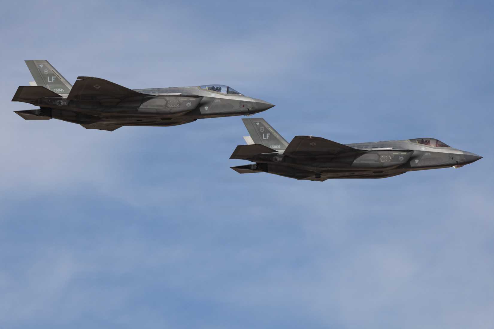 Two F-35s swiftly fly past show center as they complete the opening ceremonies during the Luke Days 2026 airshow, March 22, 2026.