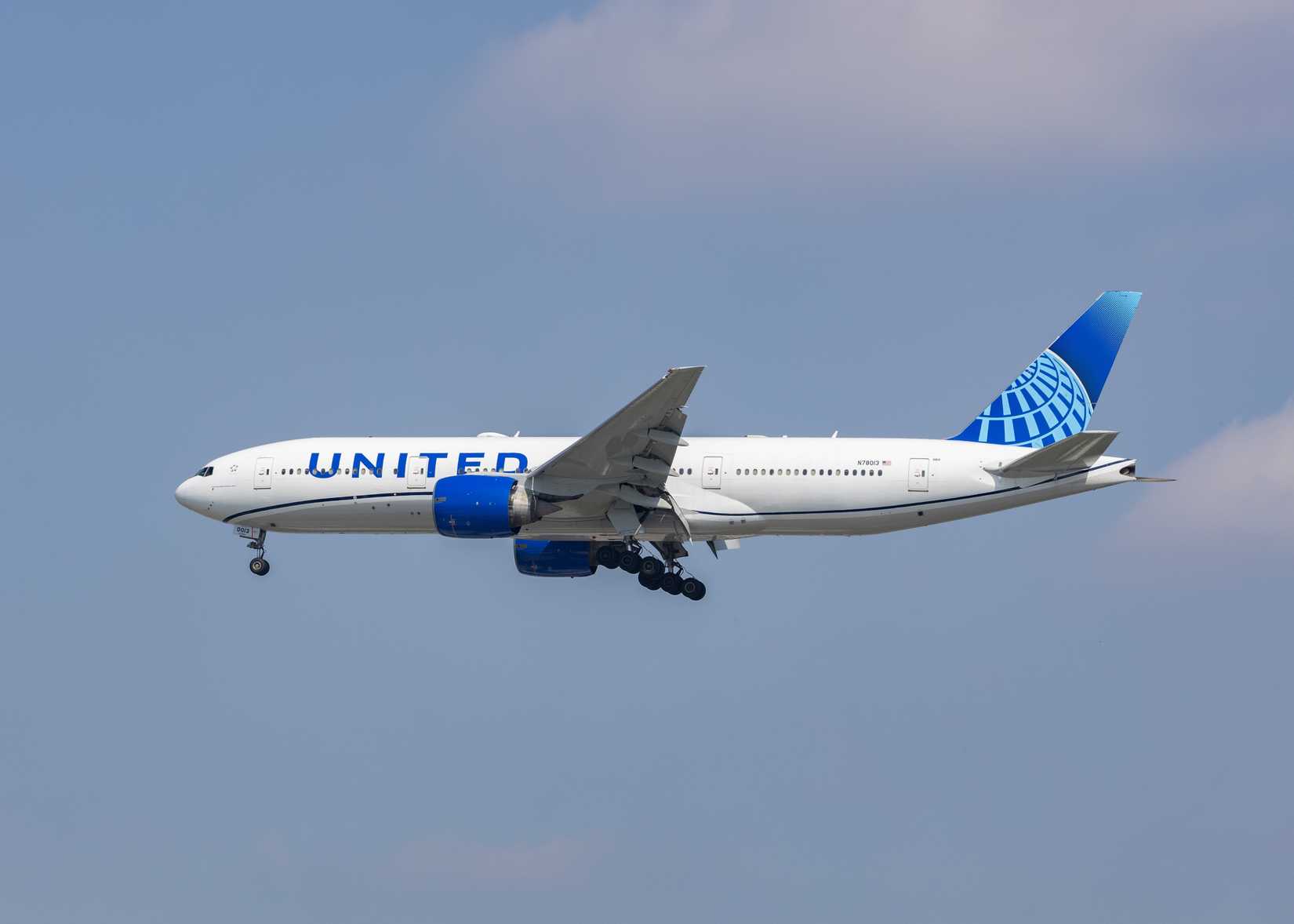 United Airlines, Registration N78013, Boeing 777 coming in to land.