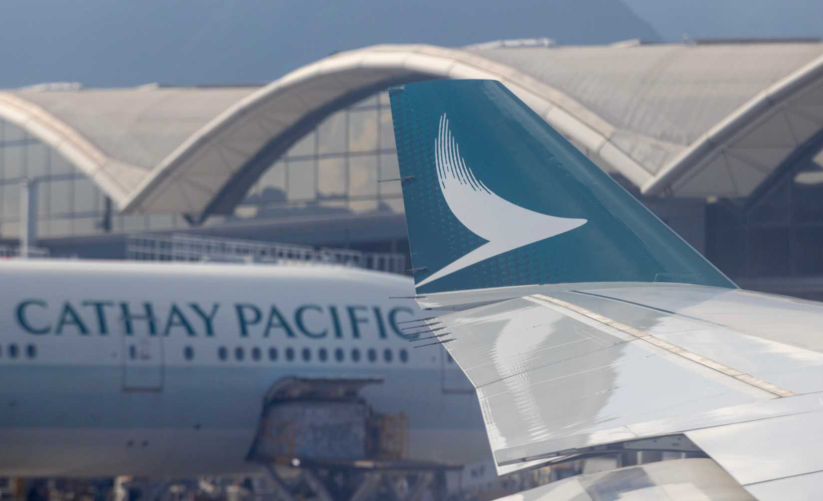 Winglet close up of Cathay Pacific jetiner from inside the cabin.