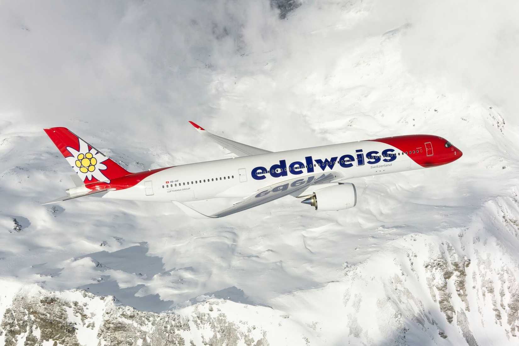 Edelweiss Airbus A350-900 over snow-capped mountains