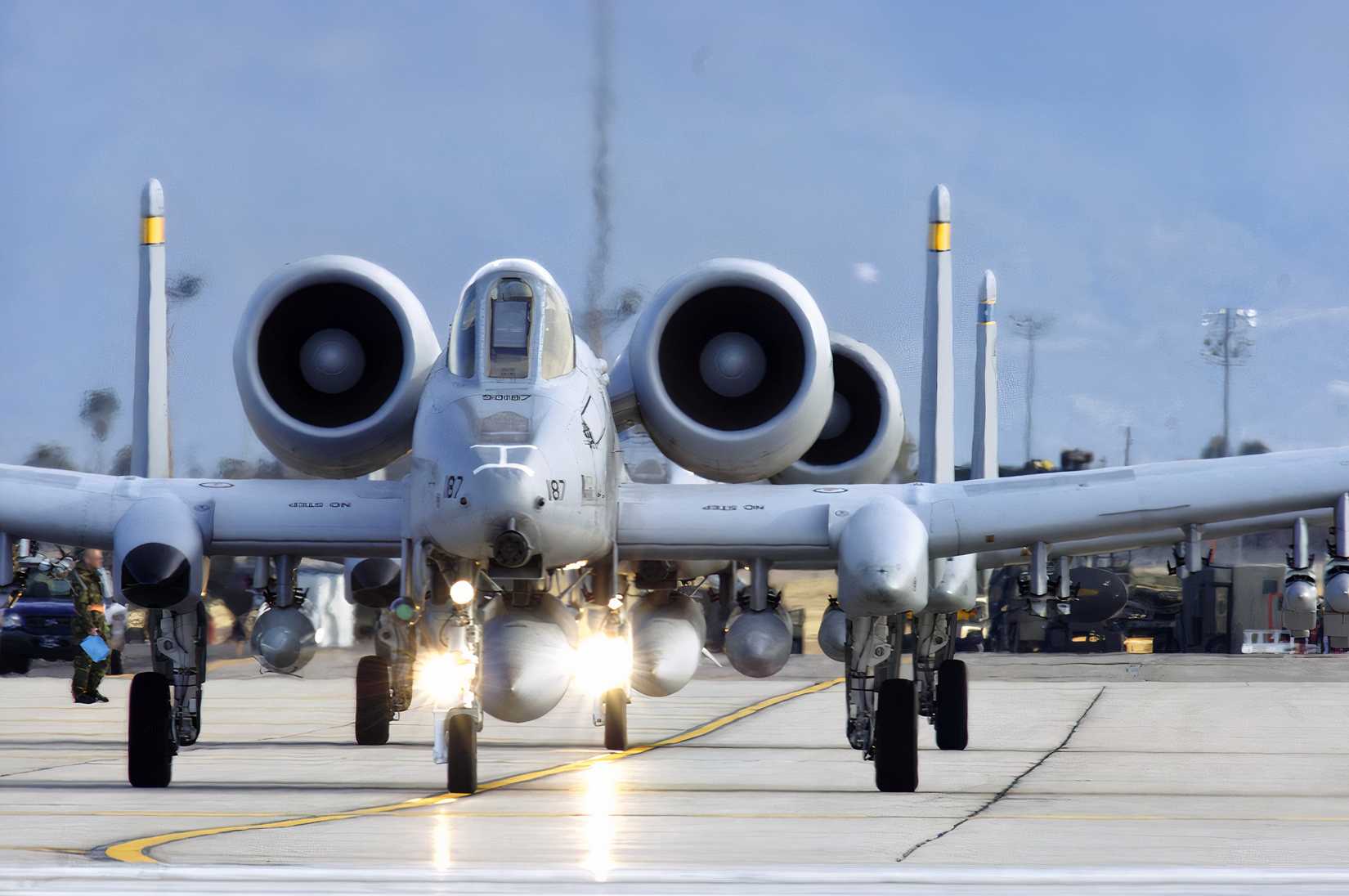 A-10s on a runway preparing to take-off