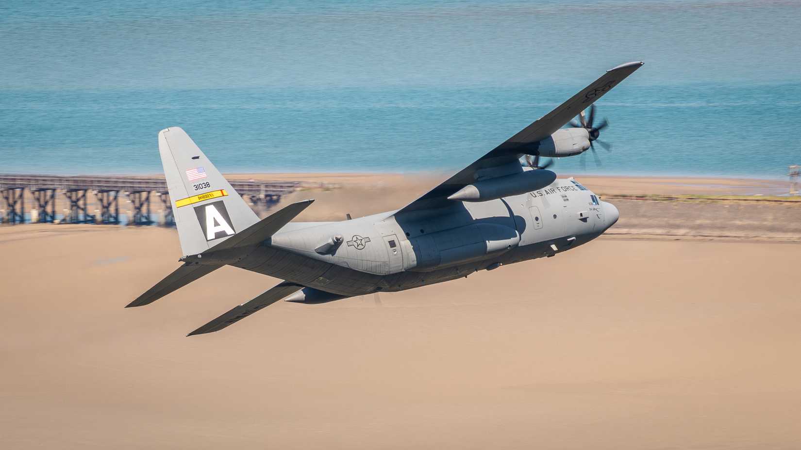 A C-130H Hercules assigned to the 94th Airlift Wing, flies over Wales, United Kingdom, May 15, 2025.
