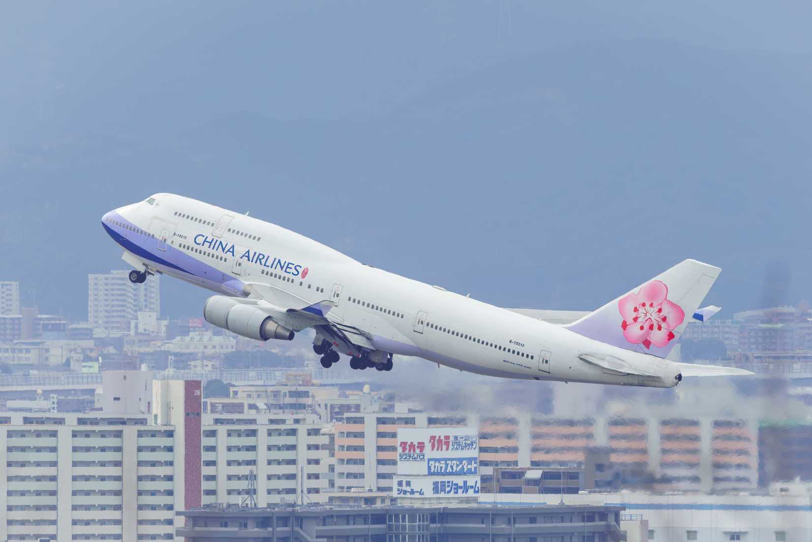 A China Airlines Boeing 747-400 aircraft (B-18212) takes off from Fukuoka Airport.