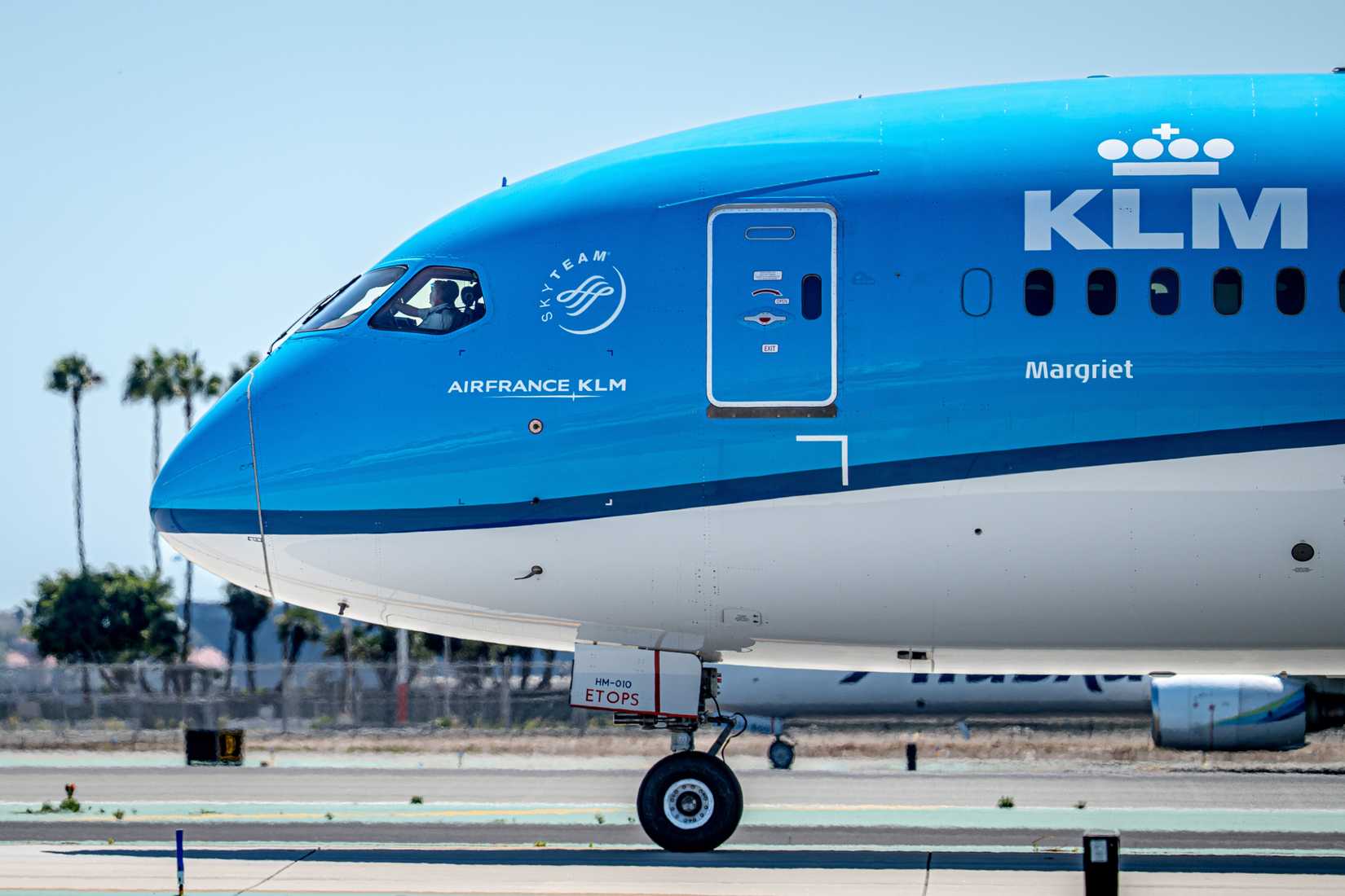 A KLM Boeing 787 “Dreamliner” taxiing by on its way to takeoff from San Diego, California.