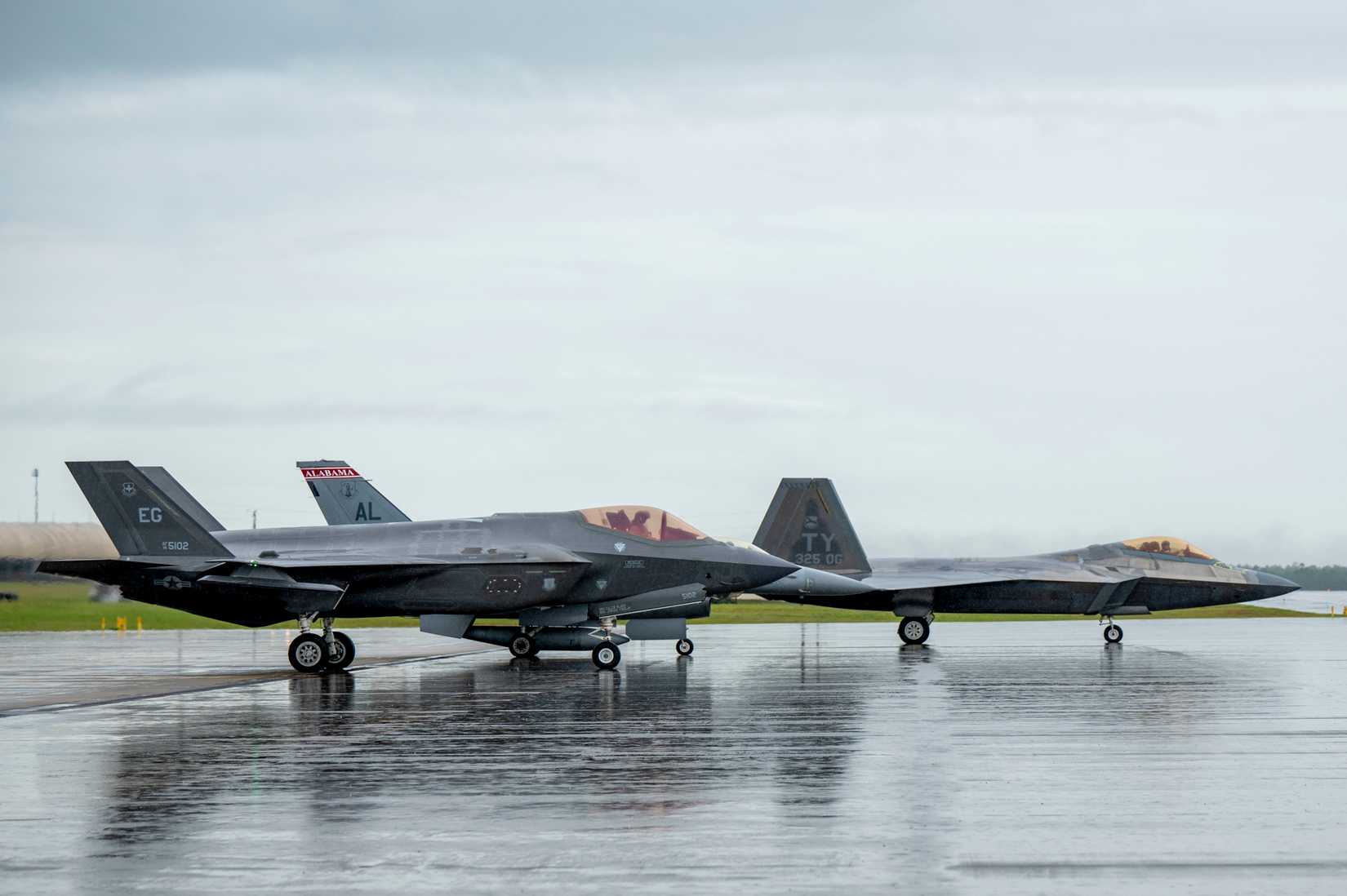 A U.S. Air Force F-35A Lightning II, F-16 Fighting Falcon and F-22 Raptor prepare to taxi at Eglin Air Force Base, Florida, Aug. 12, 2022.