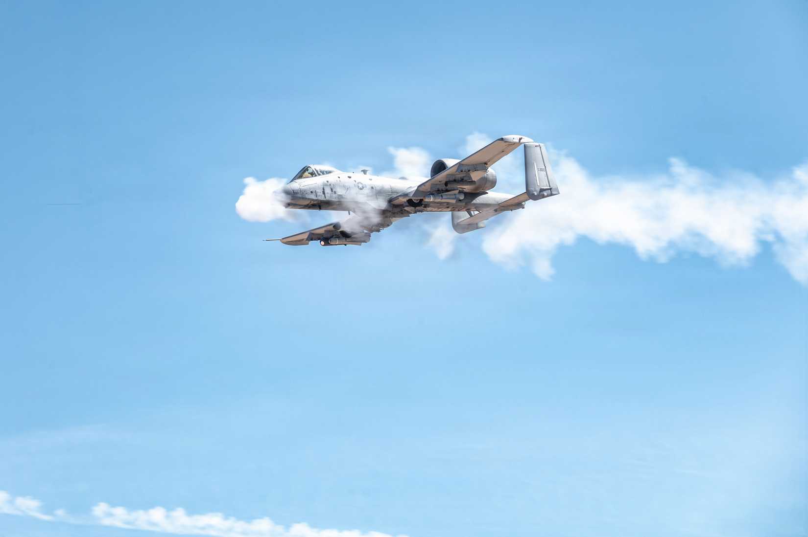 Air Force A-10C Thunderbolt II aircraft assigned to the 357th Fighter Generation Squadron fires its GAU-8A 30mm Gatling Gun at targets on a range in Gila Bend, Arizona, March 27, 2026.