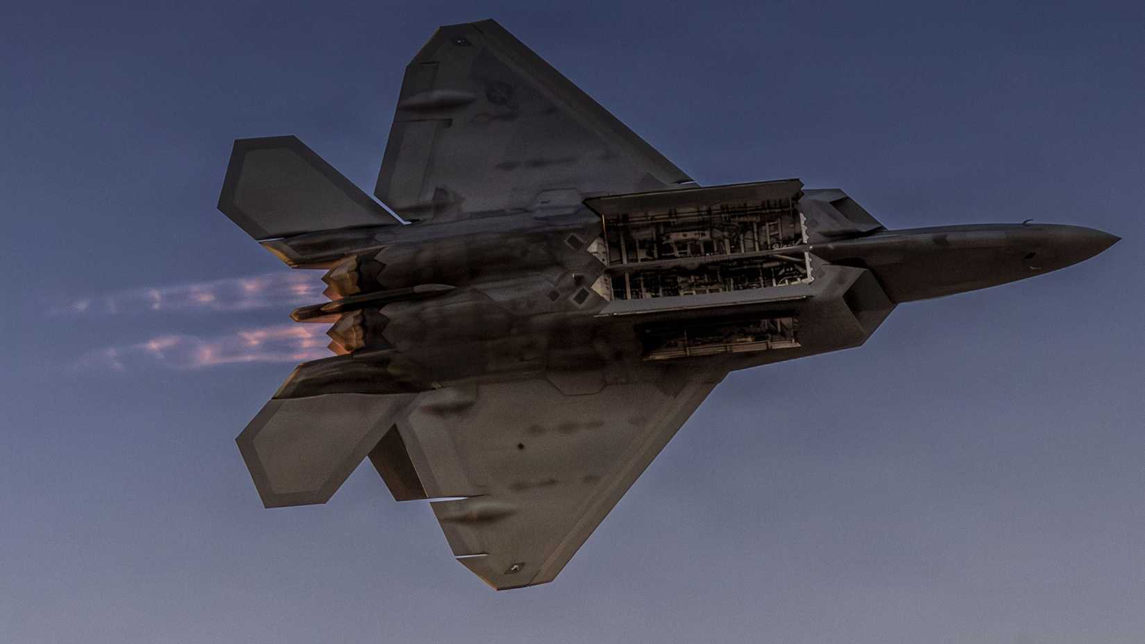 Air Force Capt. Nick “Laz” Le Tourneau, pilot and commander of the F-22 Raptor Aerial Demonstration Team, performs a practice demonstration over Langley Air Force Base.