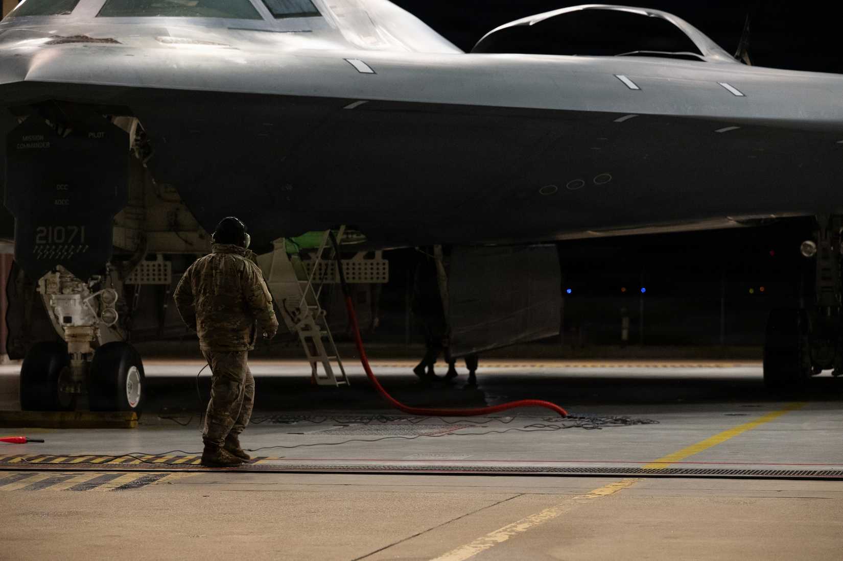 Air Force crew chiefs perform pre-flight checks on a B-2 Spirit stealth bomber during Operation Epic Fury, March 17, 2026.