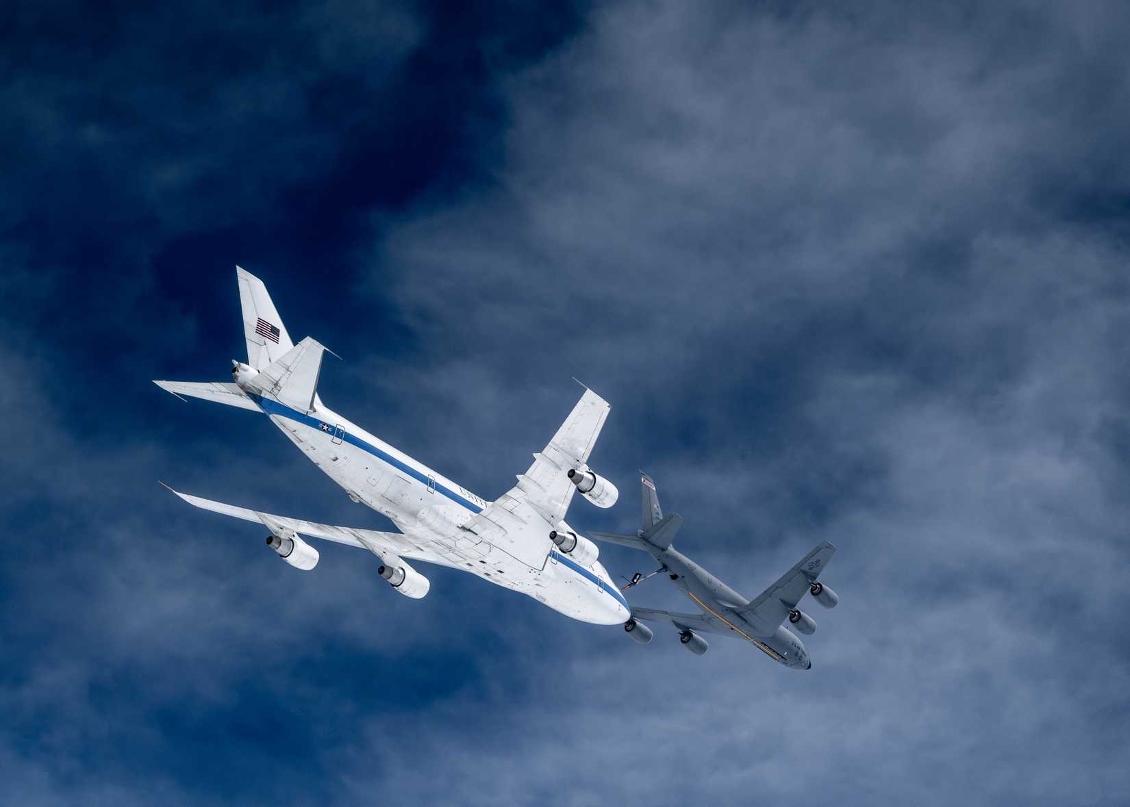 Air Force E-4B assigned to the 595th Command & Control Group, Offutt Air Force Base, Neb., receives fuel from a KC-135R Stratotanker.