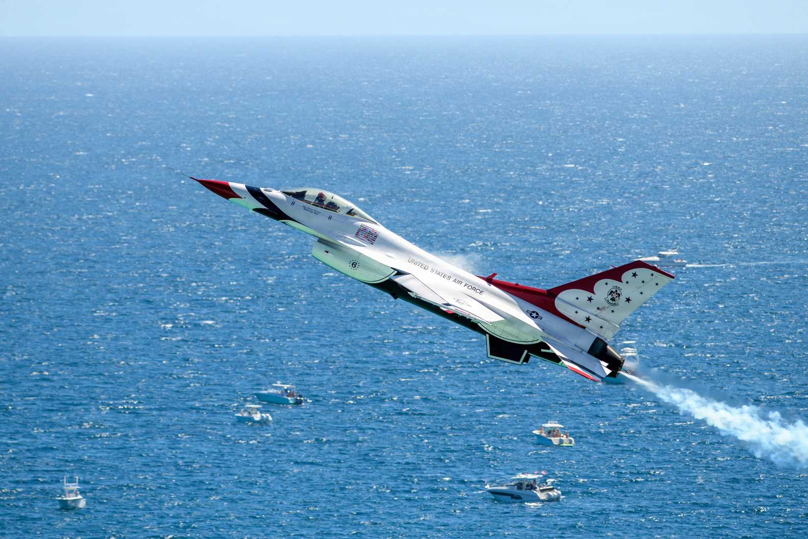 Air Force F-16 Fighting Falcon assigned to the U.S. Air Force Air Demonstration Squadron Thunderbirds, performs a high alpha pass.