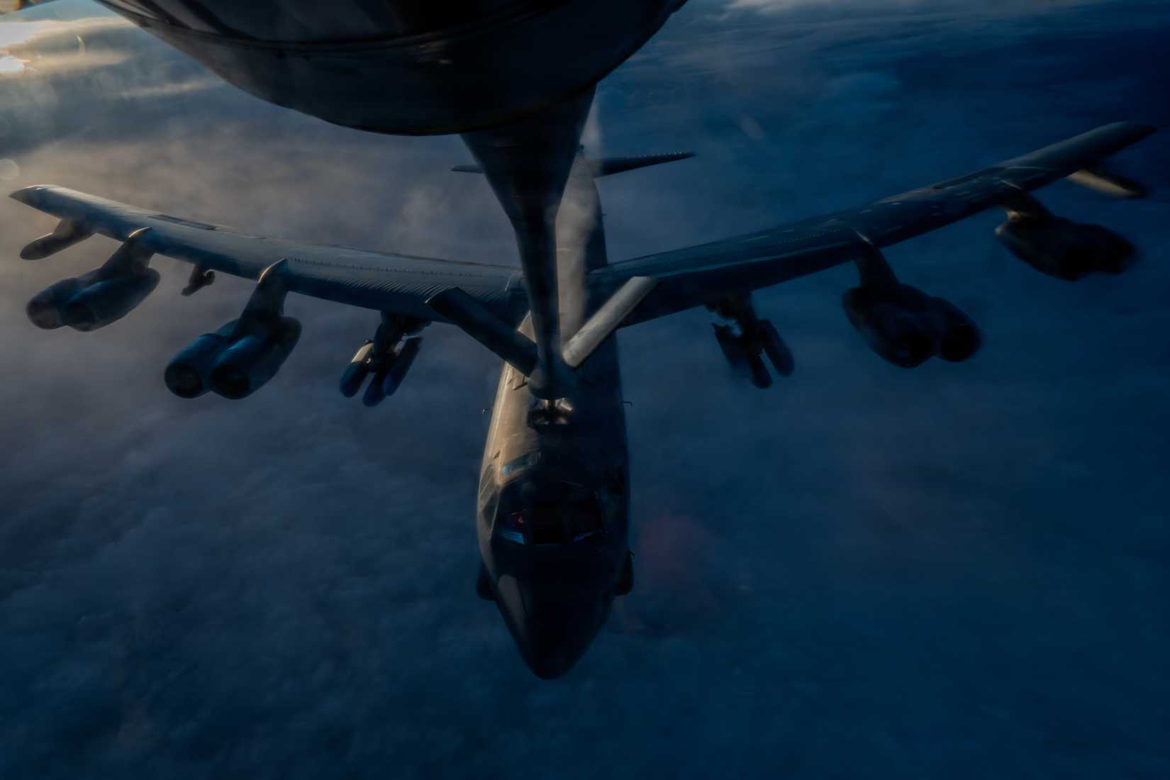 Air Force KC-135 Stratotanker aircraft refuels a B-52H Stratofortress aircraft during Operation Epic Fury over the Central Command area of responsibility.