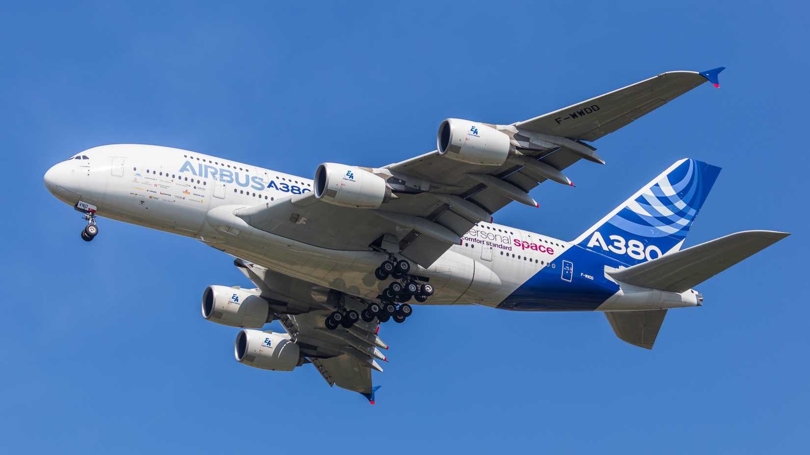 Airbus livery A380 flying across clear skies