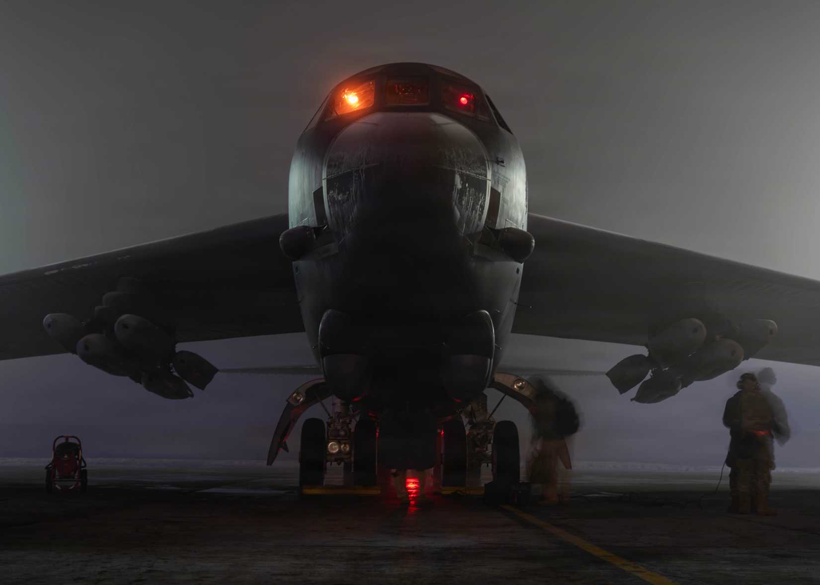 Aircrew members board a B-52H Stratofortress prior to taking off in support of Operation Epic Fury.
