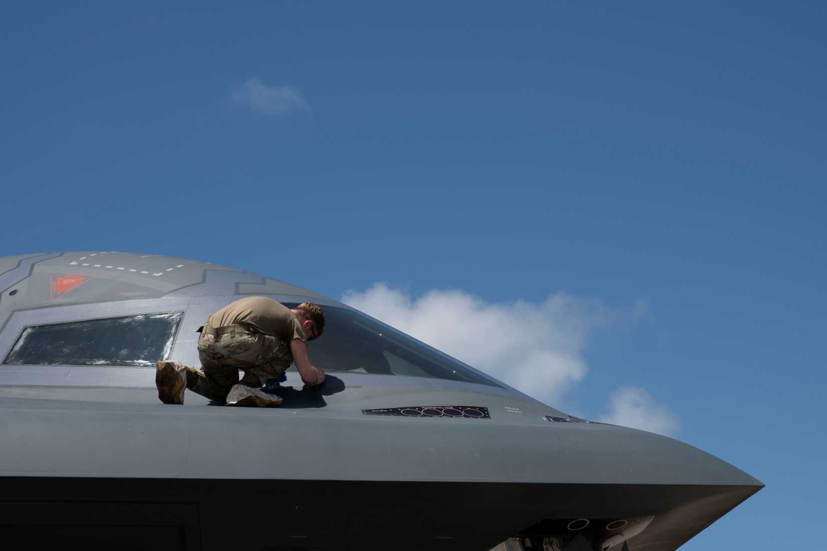 Airman assigned to the 393d Expeditionary Bomb Squadron performs maintenance on B-2 Spirit stealth bomber at Diego Garcia, British Indian Ocean Territory, April 11, 2025.