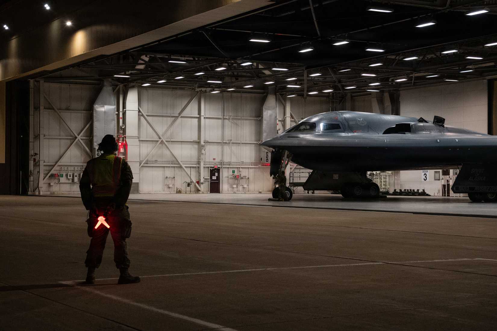 Airmen conduct preflight operations prior to a B-2 Spirit stealth bomber departing in support of Operation Epic Fury.