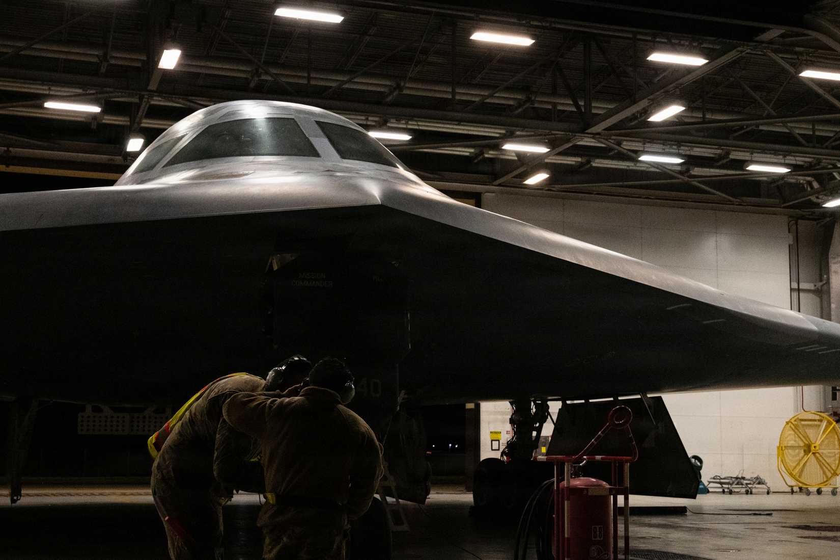 Airmen conduct preflight operations prior to a B-2 Spirit stealth bomber