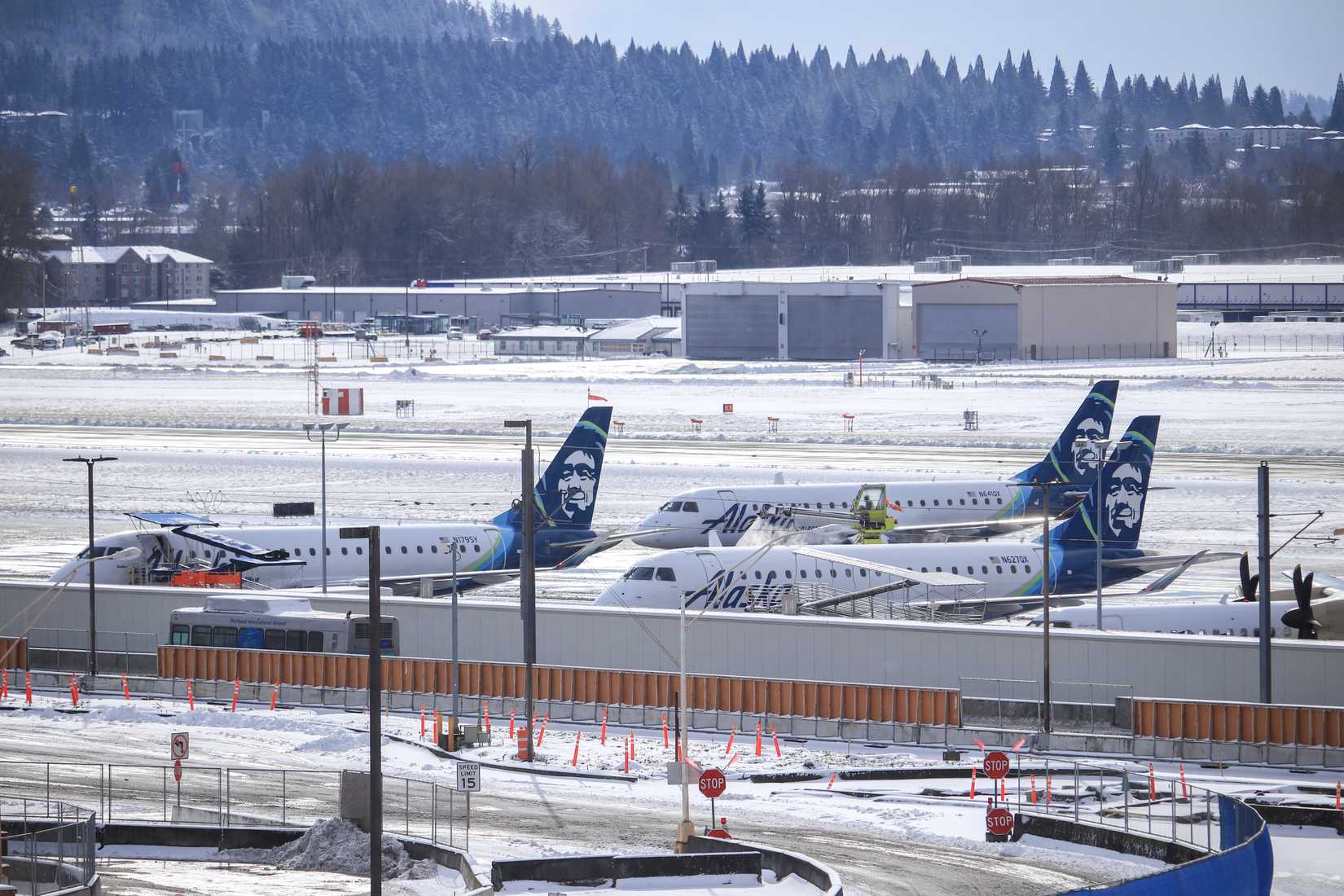 Alaska Airlines aircraft parked on apron at Portland PDX